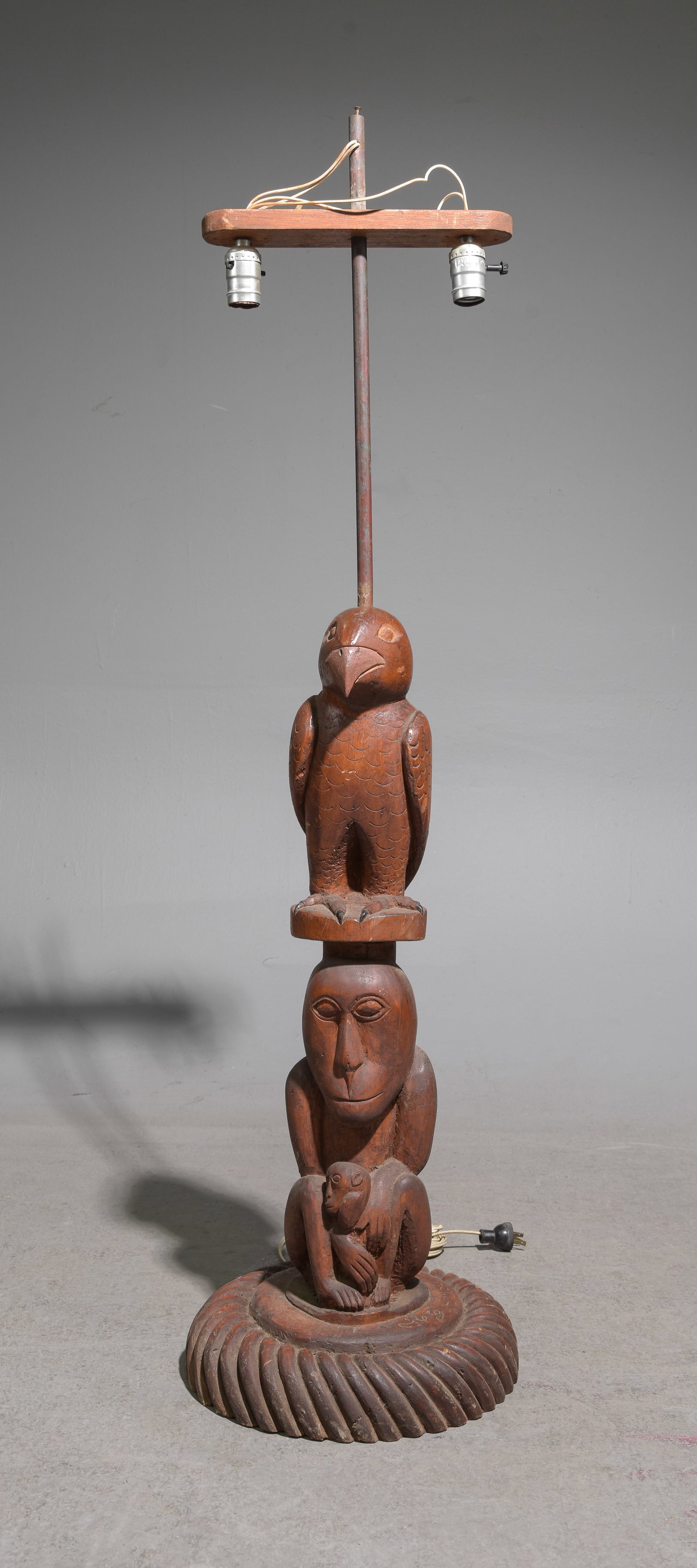 Nepalis Carved Jungle Floor Lamp: Nepalis Carved Jungle Floor Lamp - 49 in tall x 12 in diameter