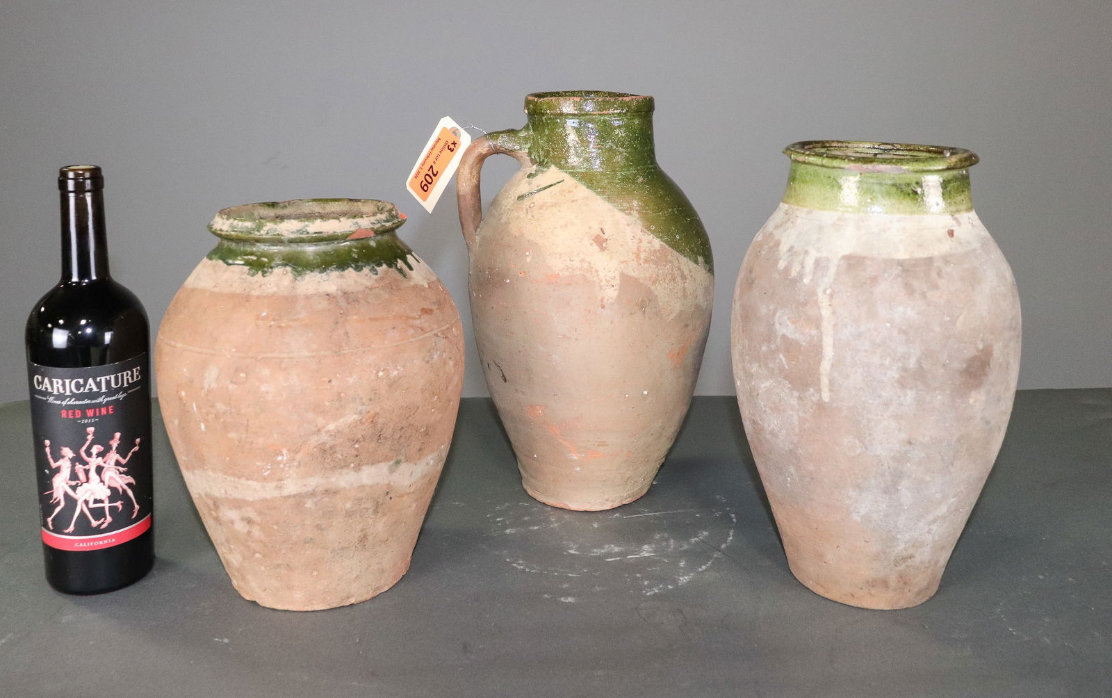 Three Green Glazed Olive Jars: Three Green Glazed Olive Jars - 13.5 in tall x 8 x 8, 10.5 in tall x 8.5 in diameter