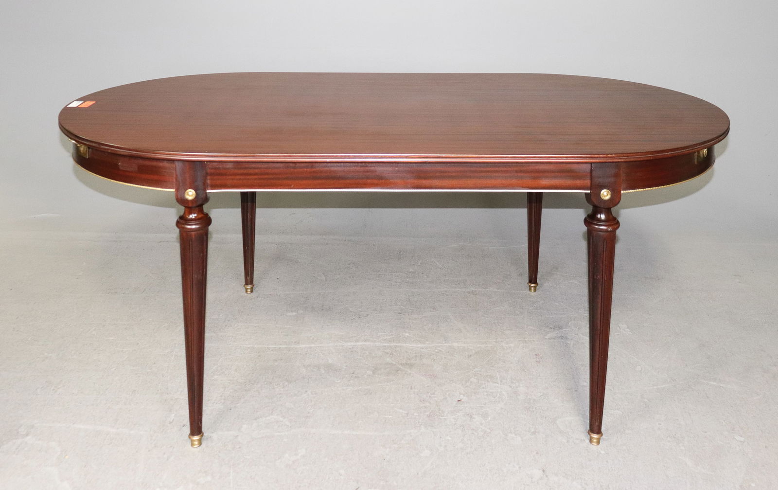 Louis XVI Style Oval Mahogany Dining Table: French Louis XVI Style Oval Mahogany Dining Table - 30 in tall x 75 x 39.5, floor to apron is 26 in tall and space between legs is 36 in wide