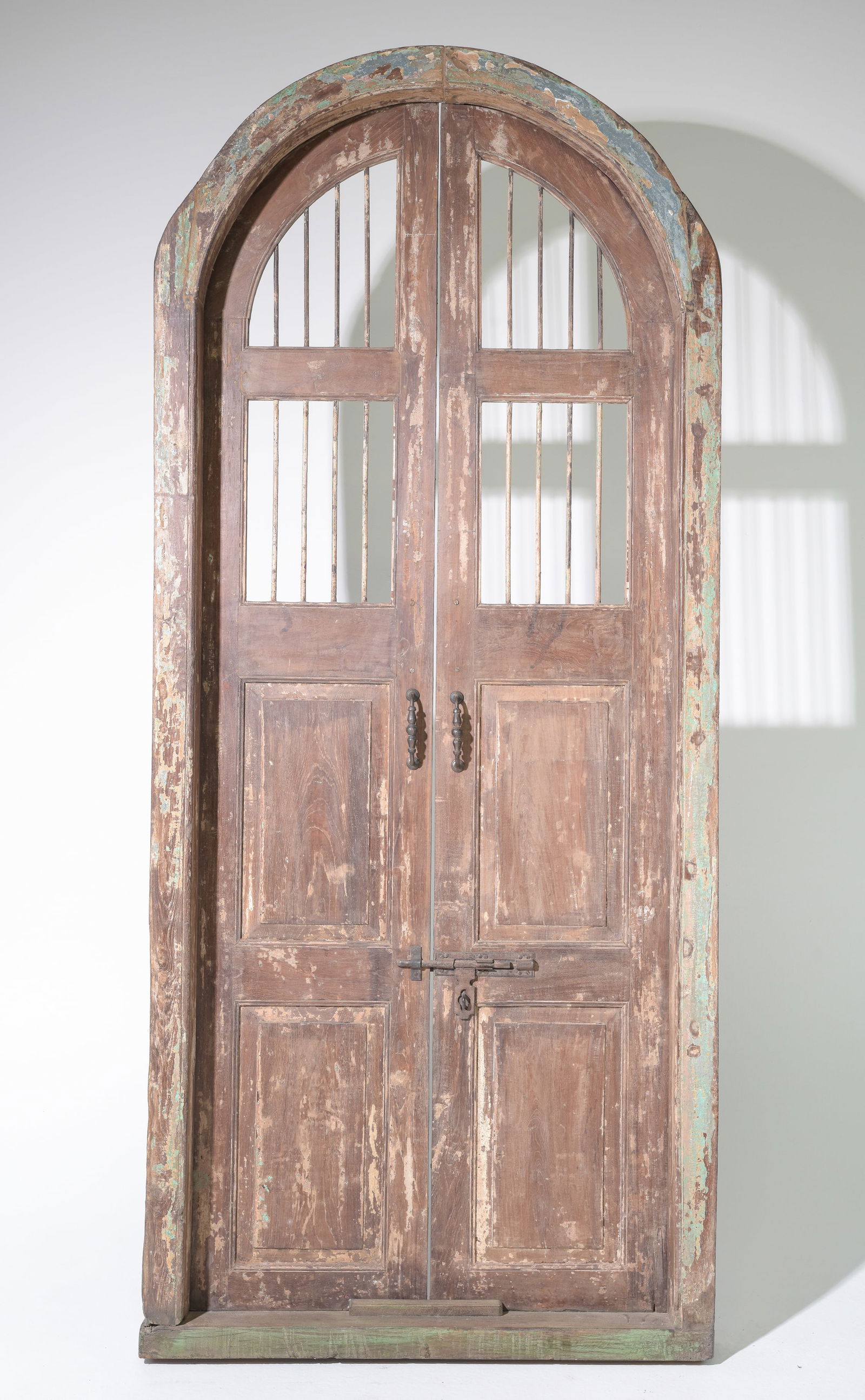 Large Arch Top Wood Door with Iron Bars (1 of 6)