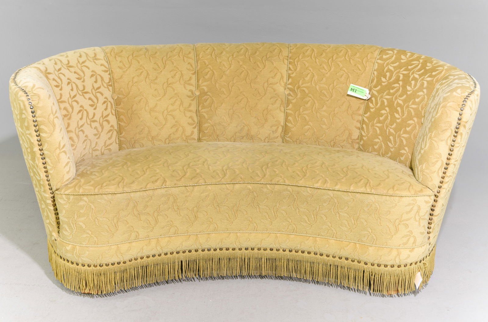 Danish Curved Back "Banan" Sofa with Fringed Skirt: Danish Curved Back "Banan" Sofa with Fringed Skirt - 27 in tall x 62.5 x 31 with a seat height of 15 inches