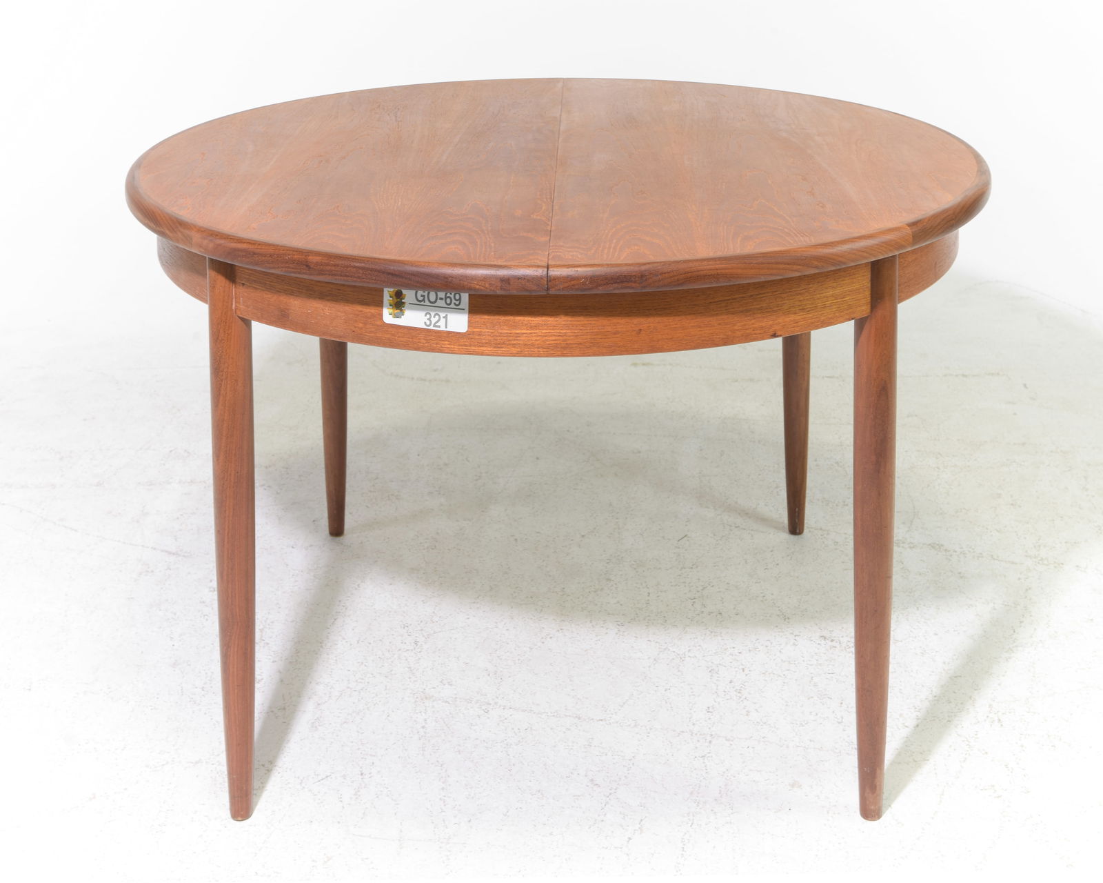 Round Mid Century Table By G-Plan - Pop Up Leaf: This Danish Modern Style Teak Dining Table includes a pop-out butterfly style leaf & is made by Mid Century Modern Furniture Maker G Plan ( GPlan ) - Part of their Fresco Range. - 29 in tall x 48 inch