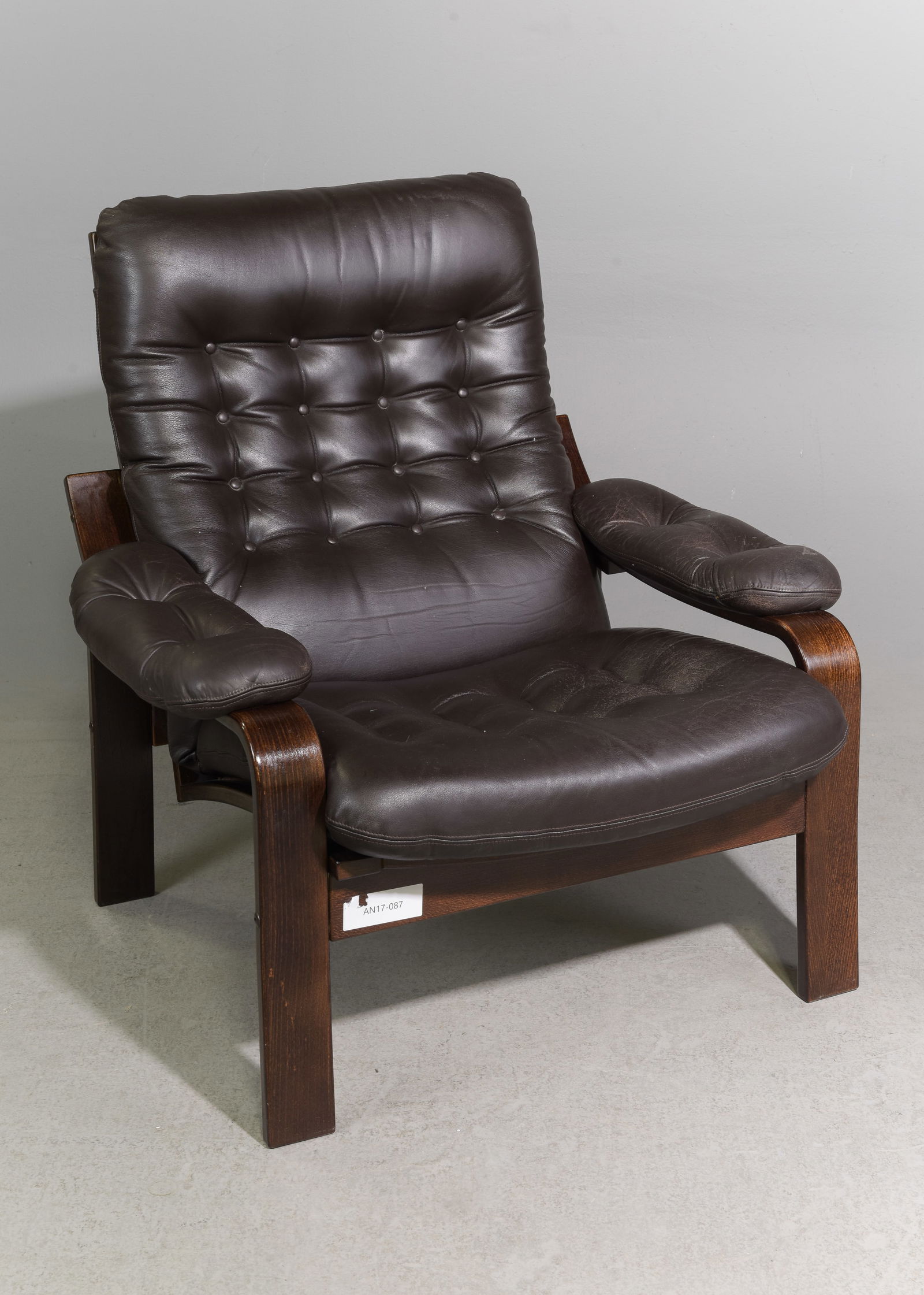 Danish Modern Tufted Leather Lounge Chair: Danish Modern Tufted Leather Lounge Chair - 35 in tall x 34 x 36 with a seat height of 15.5 inches