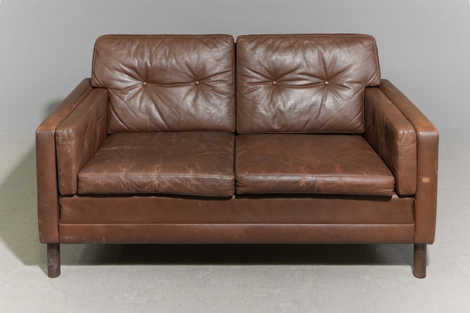 Danish Modern Brown Leather 2 Seater Sofa: Danish Modern Brown Leather 2 Seater Sofa / Loveseat - 30.5 in tall x 55.5 x 31 with a seat height of 16.5 inches