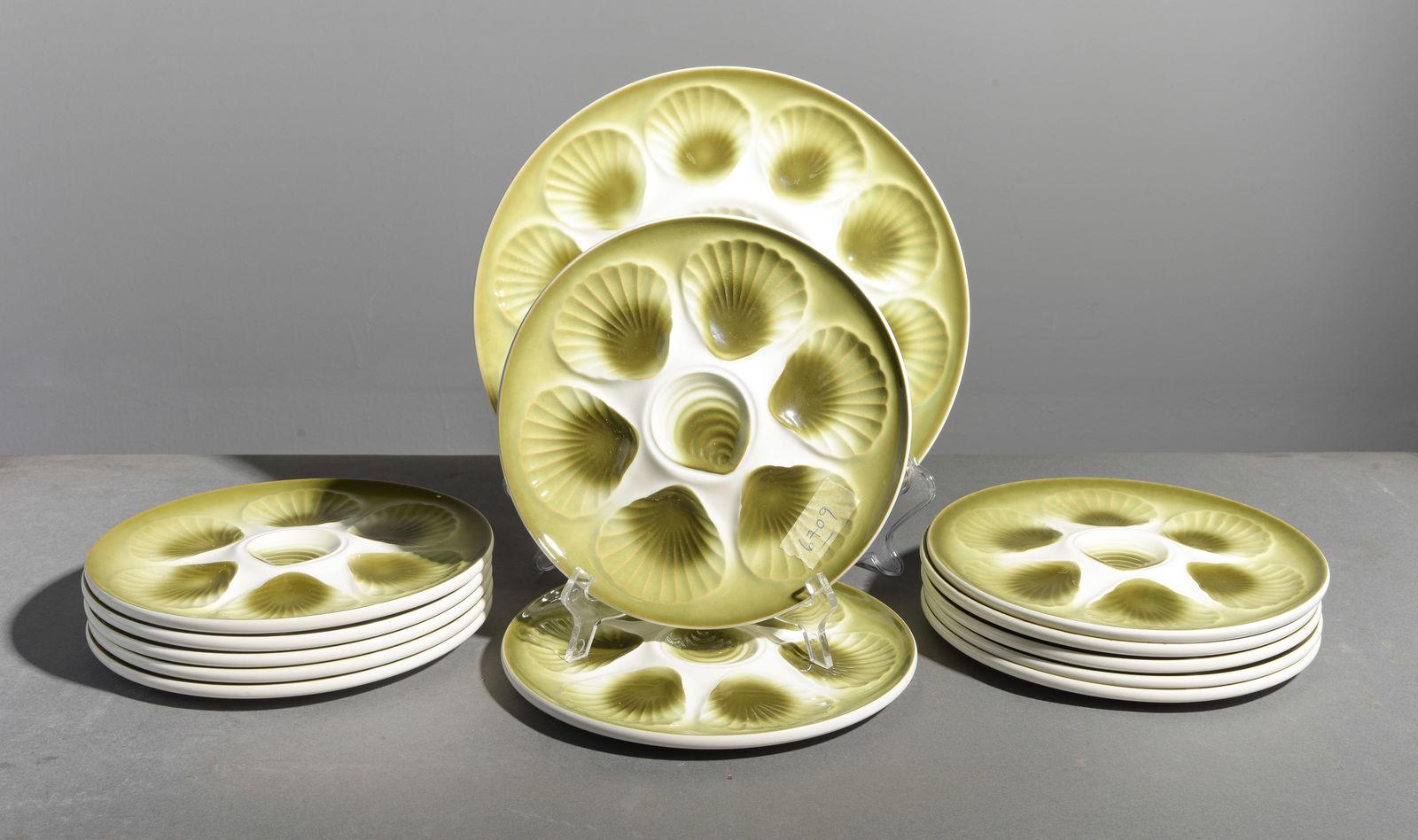 13pc Green Scallop Plate Set - Platter & 12 Plates: 13pc French Green Scallop Plate Set - Platter & 12 Plates - Platter is less than an 1 inch tall by 13 inch diameter, Plates are less than an inch tall by 9.75 inch diameter each