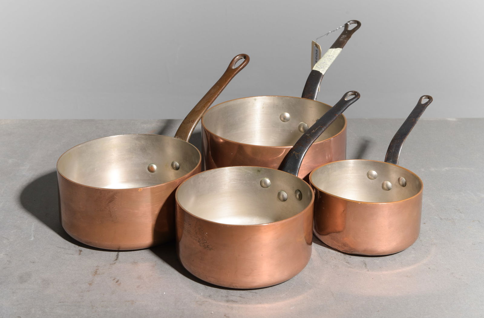 French Set of 4 Polished Copper Sauce Pans: French Set of 4 Polished Copper Sauce Pans - Largest is 7 in tall x 14.5 x 7.25 - Reminder, measurements are meant for shipping purposes