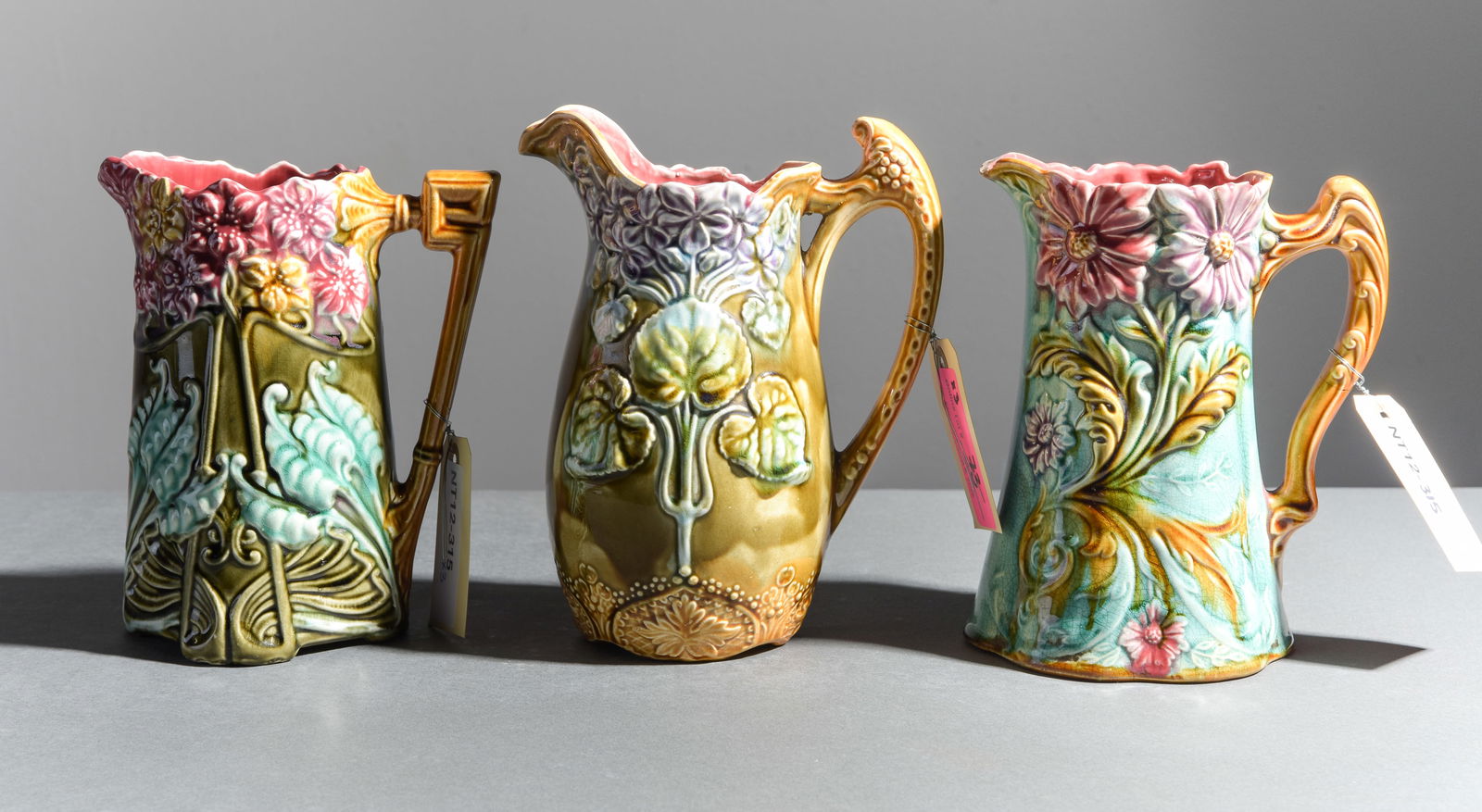 3 Onnaing Majolica Pitchers Floral Motif (1 of 4)