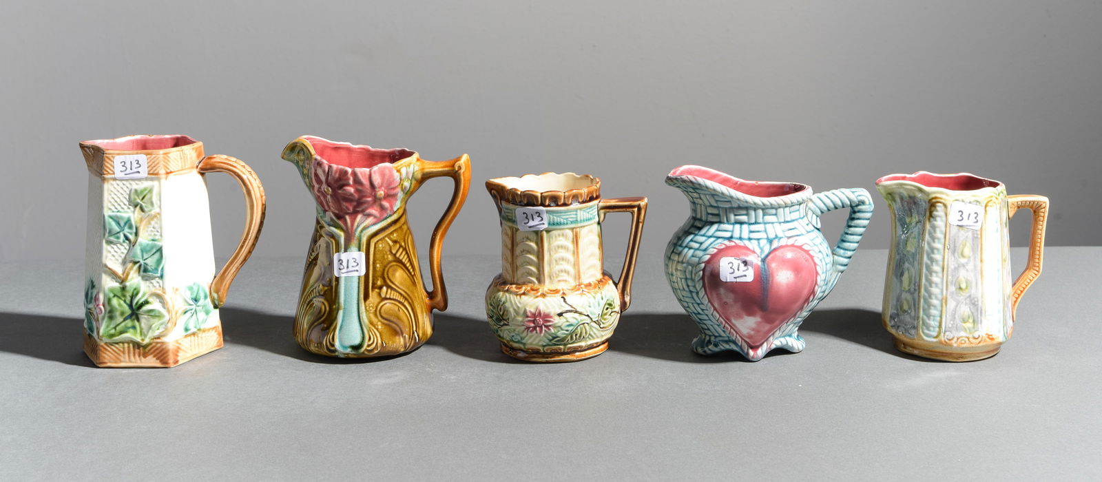 5 Onnaing Majolica Petite / Small Pitchers / Creamers: 5 Onnaing Majolica Petite / Small Pitchers / Creamers - 6 in tall x 3 x 5, 5 in tall x 4.5 x 5.5, 6 in tall x 3.5 x 5.5, 4.75 in tall x 3 x 4.75 and 4.75 in tall x 4 x 4.5