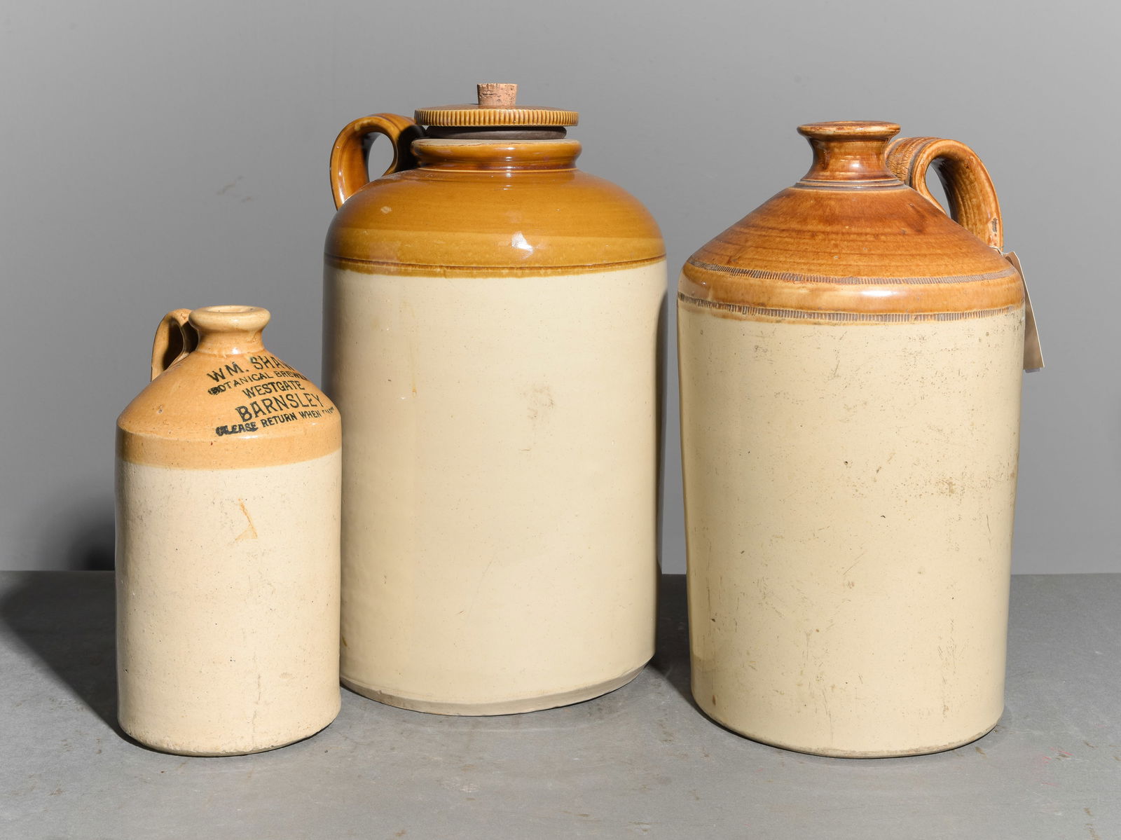 3 Stoneware Flagons / Spirit Jugs: 3 Stoneware Flagons / Spirit Jugs - Largest is 16.5 in tall x 10.5 x 9.5