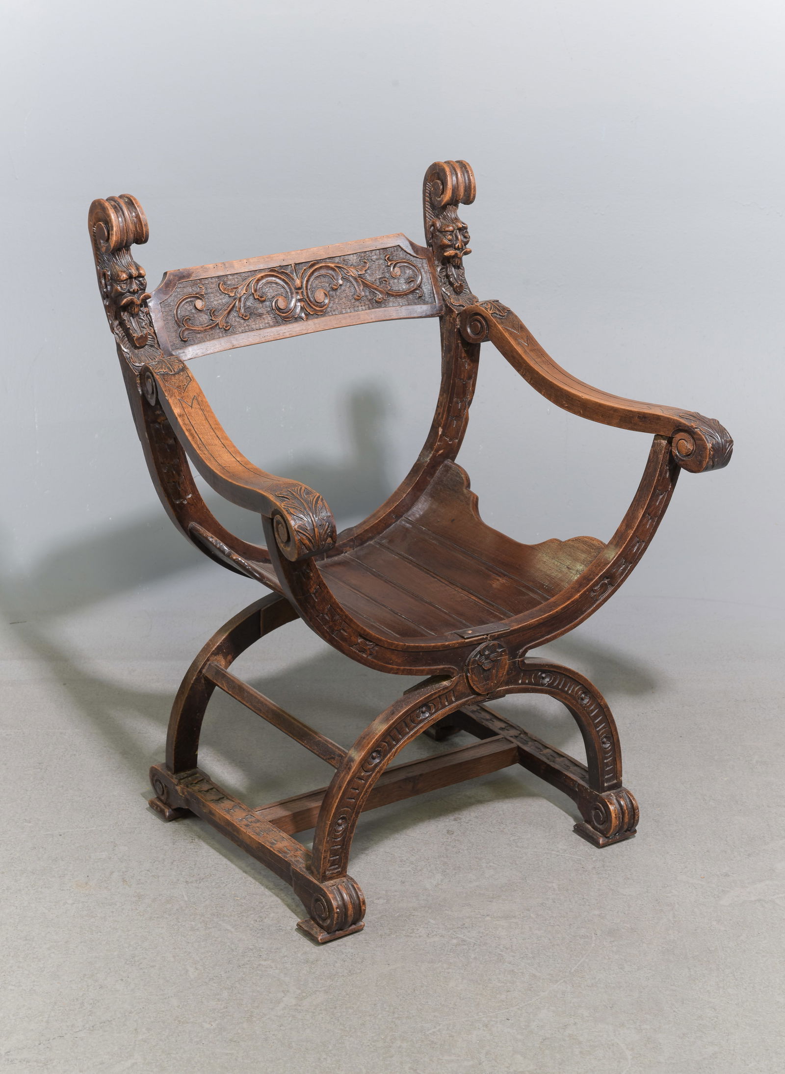 Renaissance Style Carved Walnut Arm Chair: Renaissance Style Carved Walnut Arm Chair - 34 in tall x 25.25 x 21 with a seat height of 14 inches