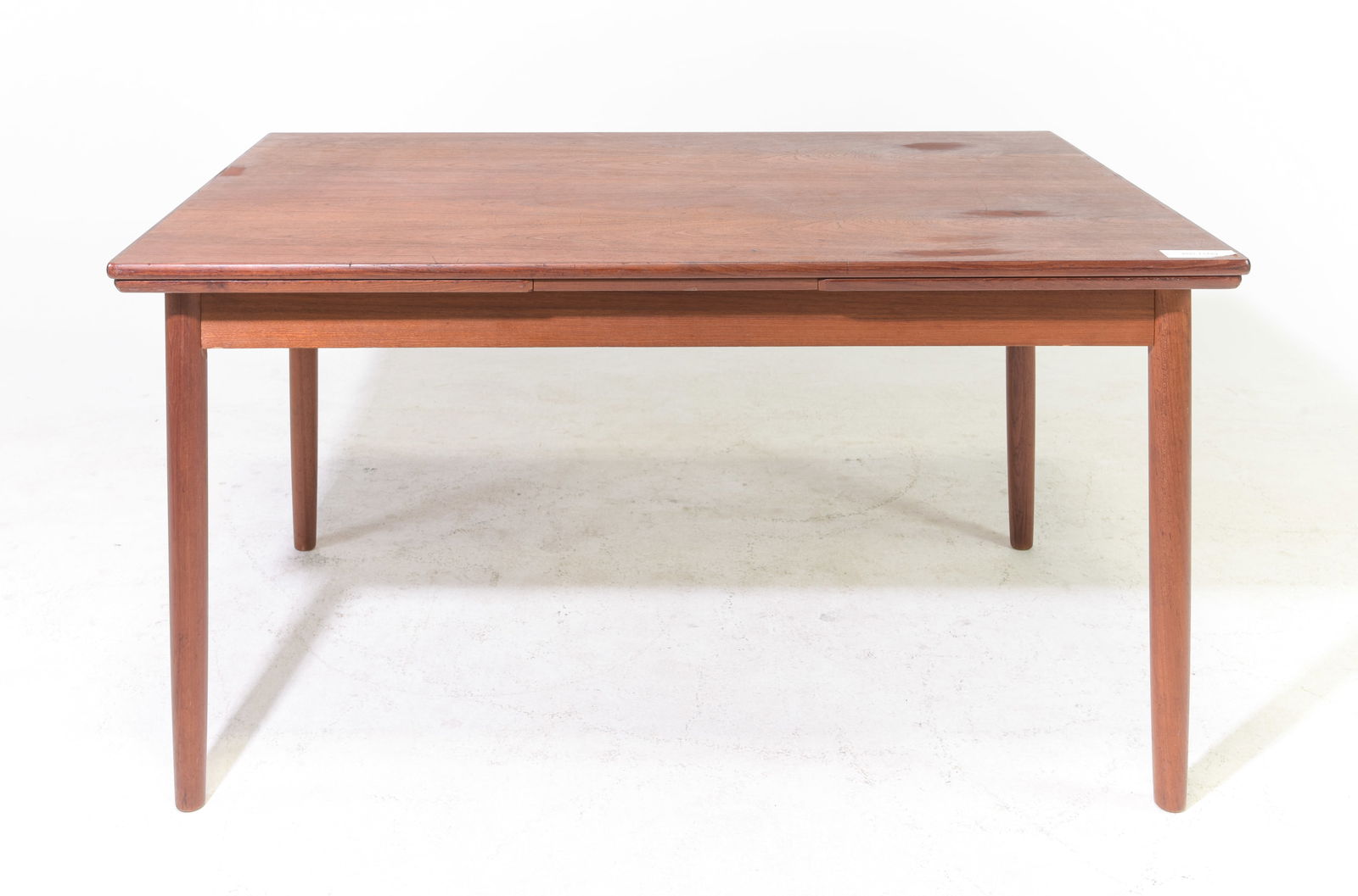 Danish Modern Draw Leaf Dining Table: Danish Mid Century Modern Draw Leaf Dining Table - 29 in tall x 55 x 35.25, Leaves add an additional 20 inches each, Floor to apron is 24 inches and the space between the legs is 47 inches