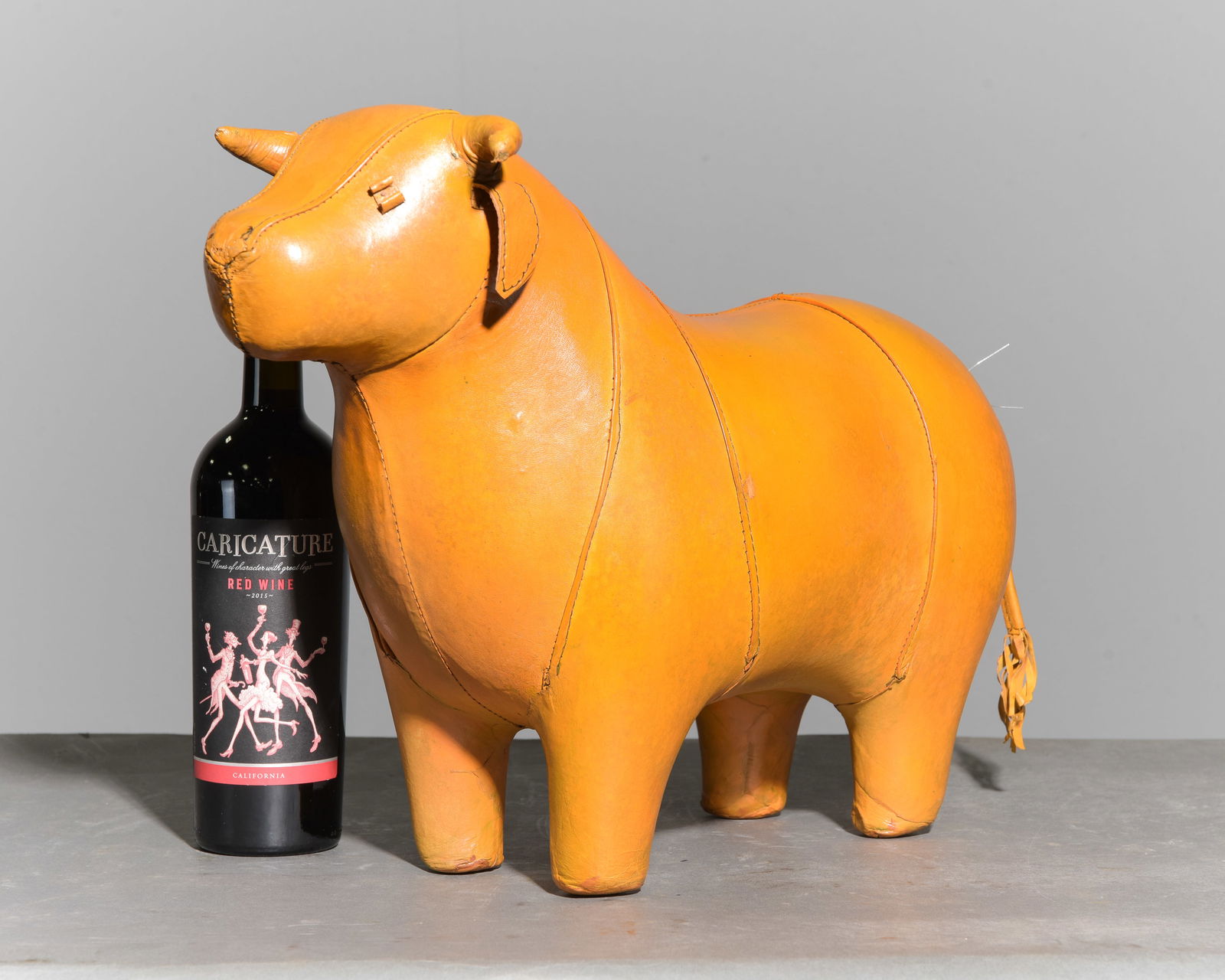 Leather Bull Stool In The Manner Of Omersa: This Bull footstool is new and made of leather in the style of those sold at Liberty & Co in London - 14 in tall x 20 x 8