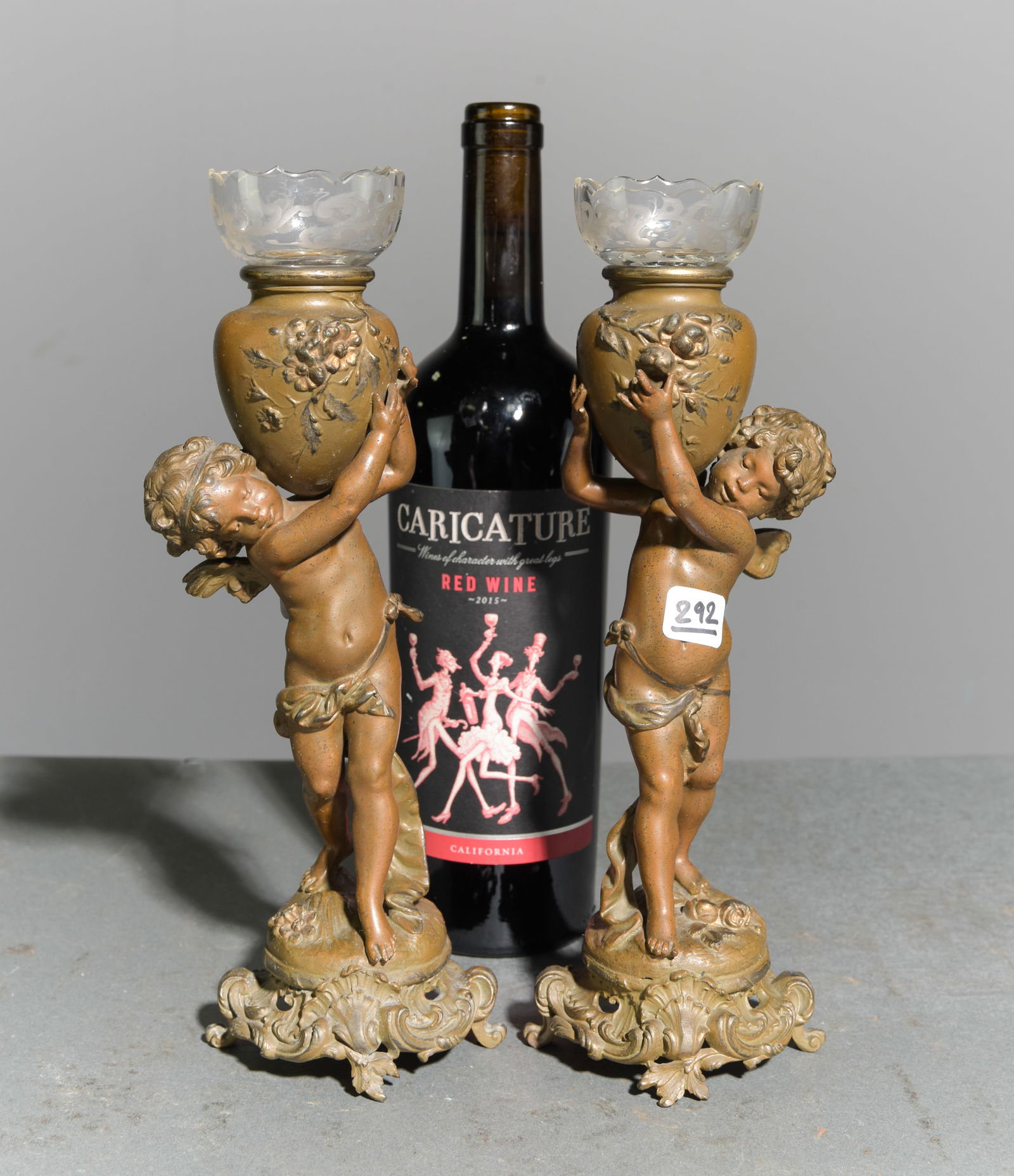 French Pair of Small Cherub Candlesticks: French Pair of Small Cherub Candlesticks with Glass Inserts - 9.5 in tall x 3.75 x 3.25 each