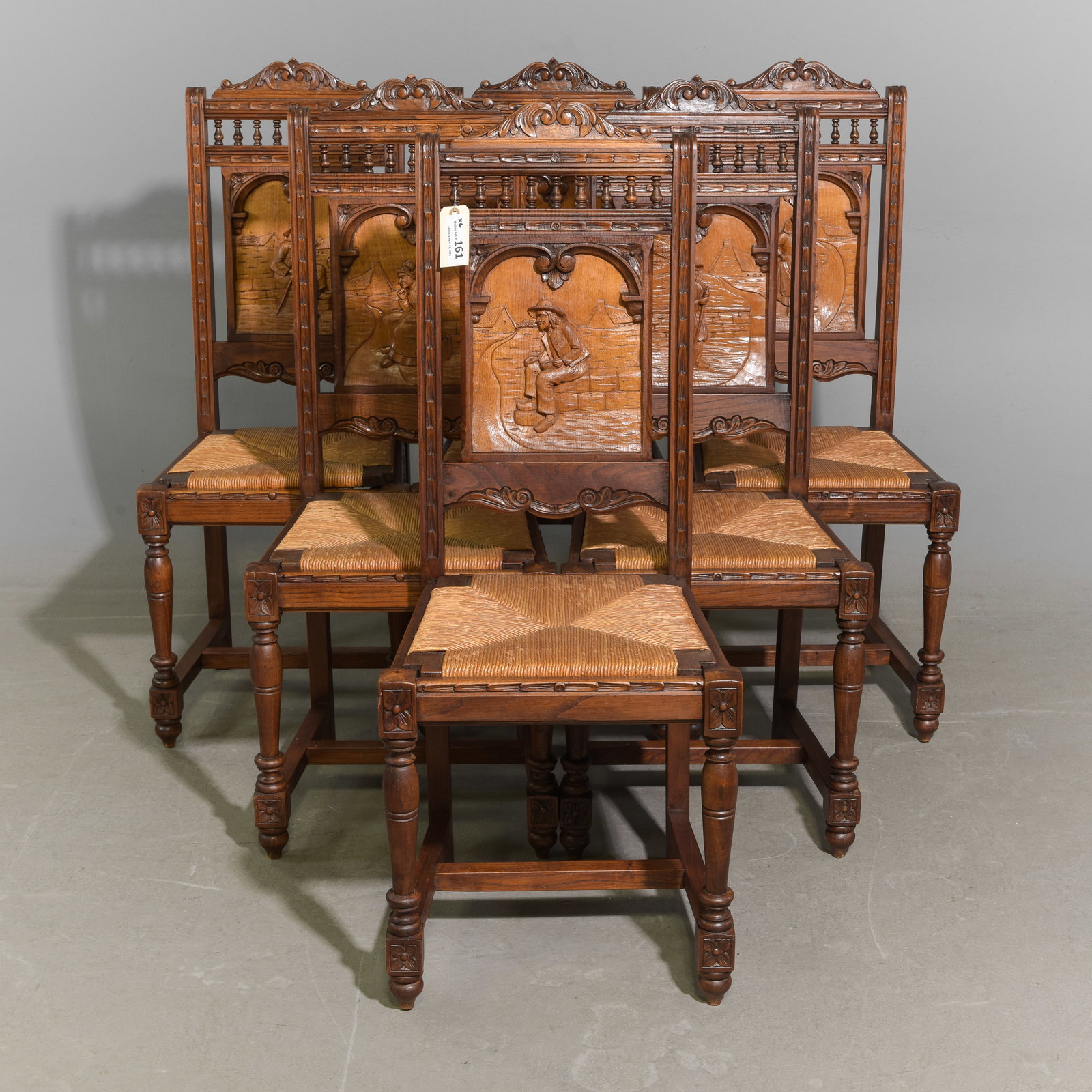 French Breton Style Set of 6 Oak Dining Chairs: French Breton Style Set of 6 Carved Oak Rush Seat Dining Chairs - 43 in tall x 17 x 16.5 each with a seat height of 17 inches