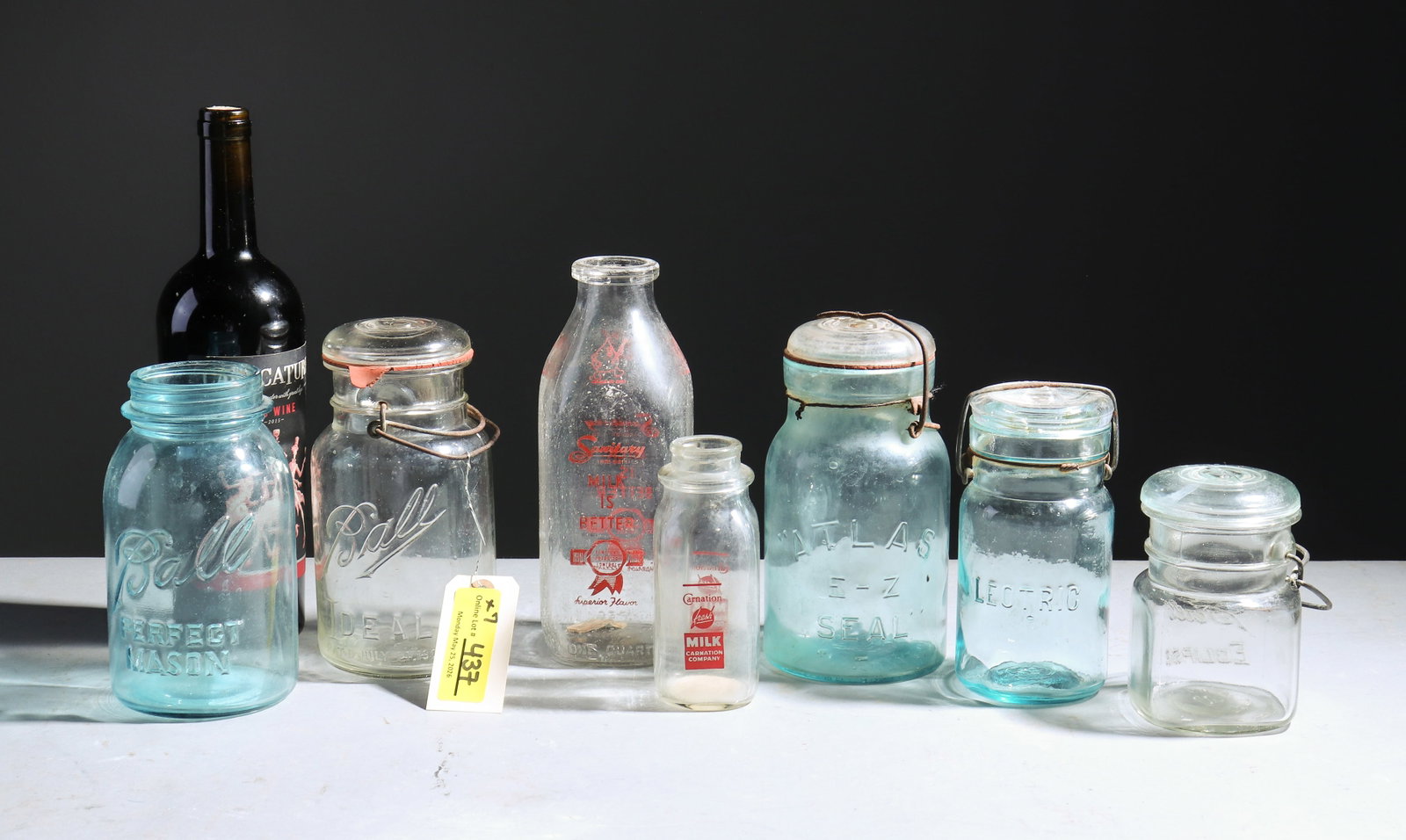 7pcs Assorted Glass Mason Jars & Milk Bottles: 7pcs Assorted Glass Mason Jars & Milk Bottles - Tallest is 7.5 in tall x 4 inch diameter