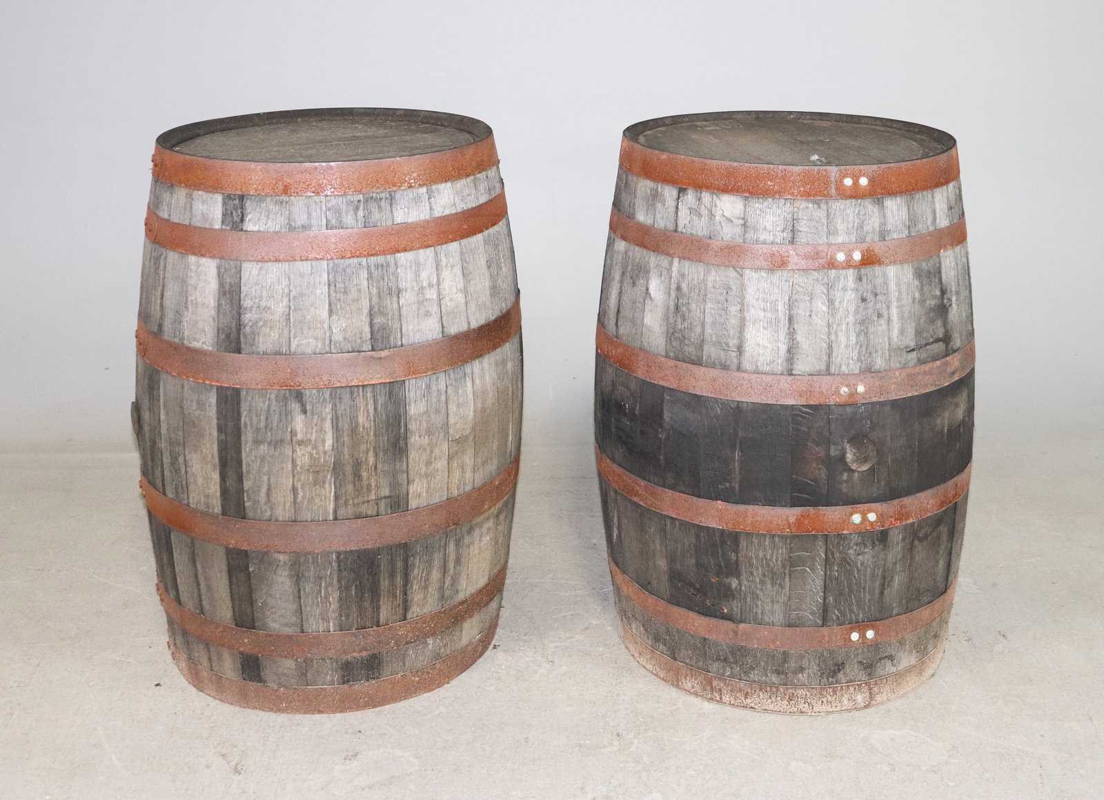 2 Vintage Rustic Iron Banded Barrels: 2 Vintage Rustic Iron Banded Barrels - 35 in tall x 24 in diameter