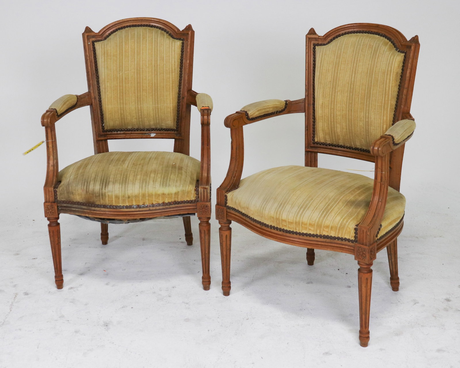 Pair Of Louis XVI Style Upholstered Arm Chairs: Pair Of French Louis XVI Style Upholstered Arm Chairs - 34.5 in tall x 21.5 x 21, seat height is 17