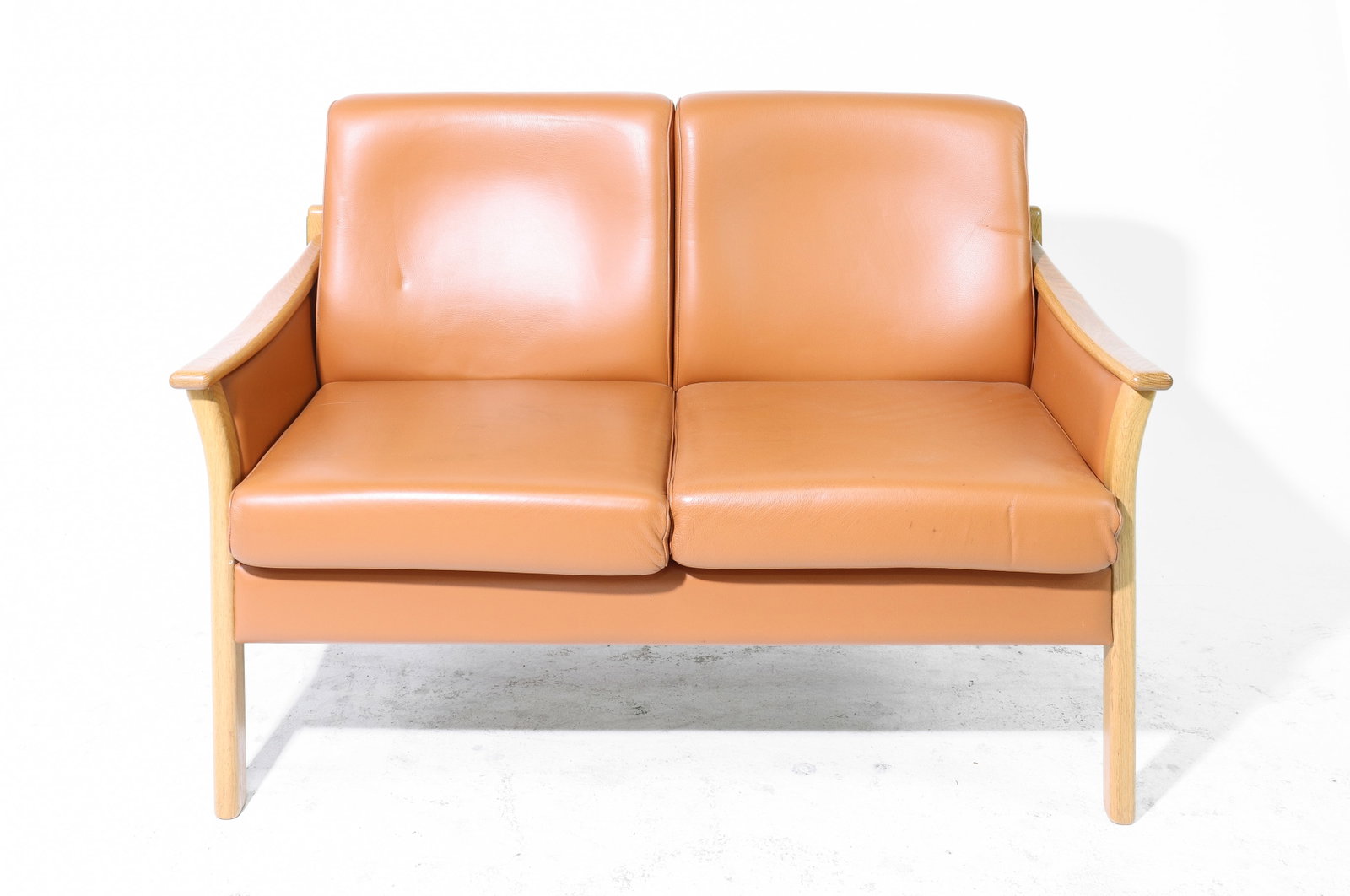 Danish Modern Tan Leather Loveseat: Danish Mid Century Modern Tan Leather Loveseat / Two Seater Sofa - 34 in tall x 50 x 27 with a seat height of 18.5 inches