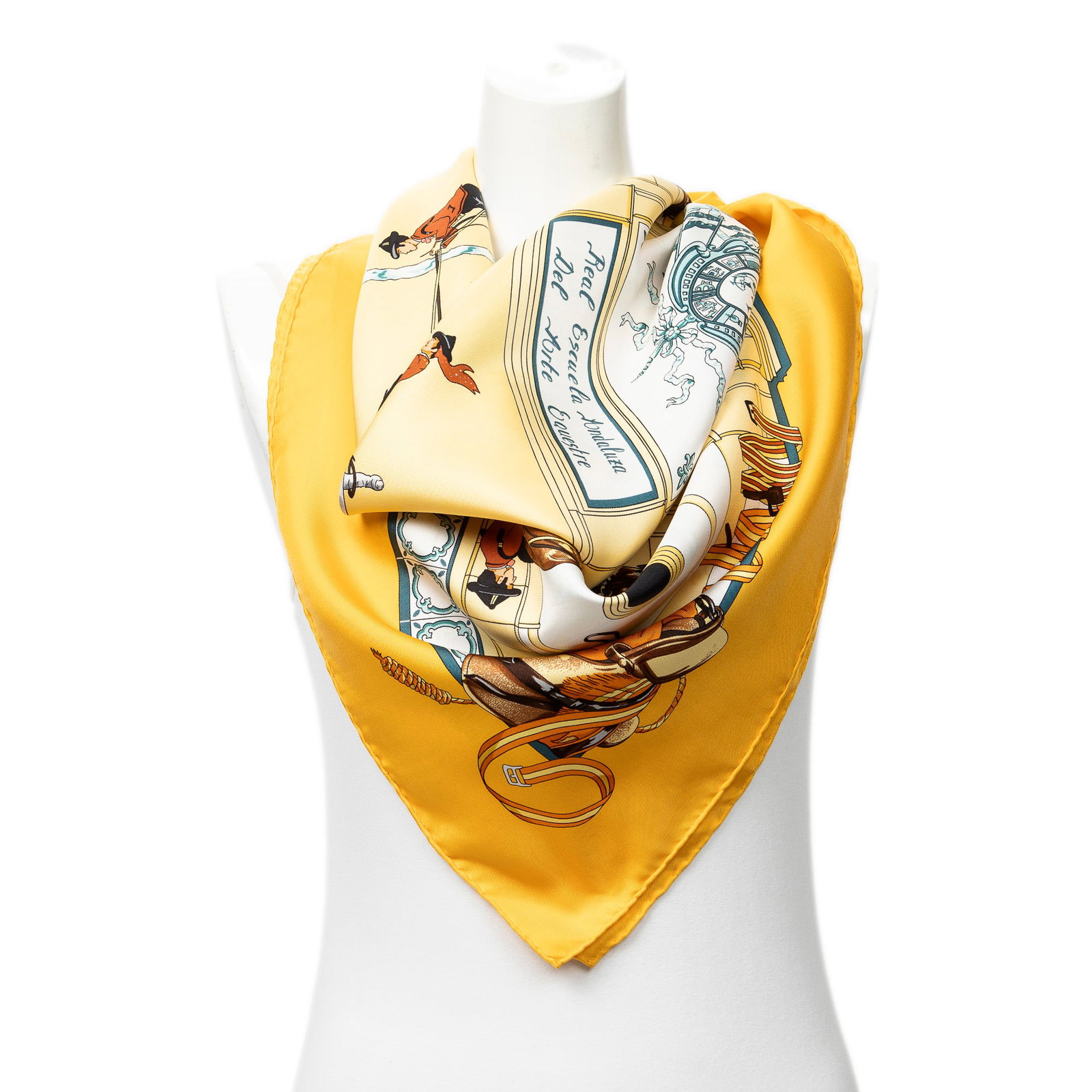 Hermes Scarf- Real Escuela Andaluza del Arte Ecuestre: Genuine Pre-Owned Hermes Scarf in Yellow/Brown/Teal 100% Twill Silk in A condition. Pattern / Title is Real Escuela Andaluza del Arte Ecuestre by Hubert de Watrigant Measurements: 90*90cm (Length * He