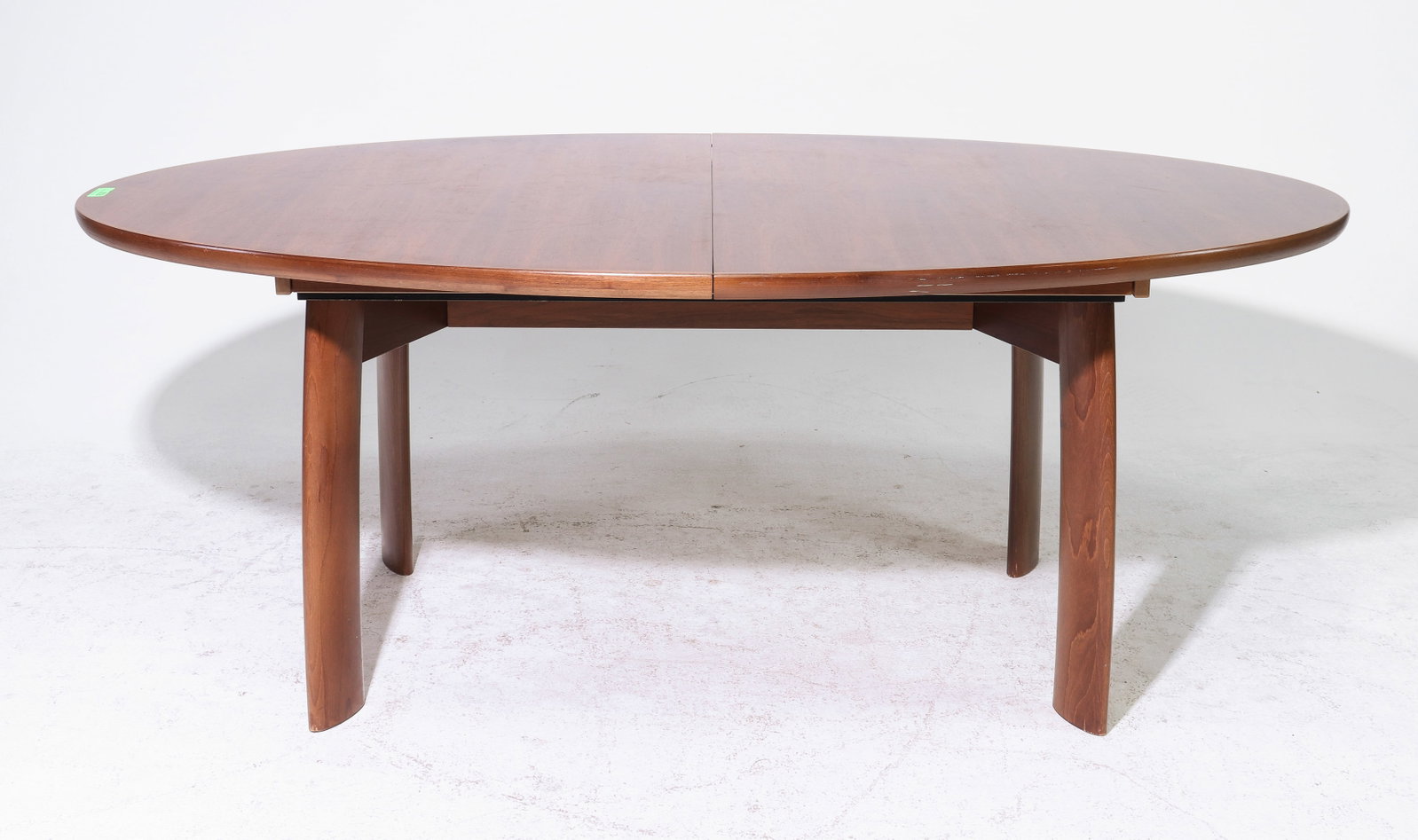 Danish Modern Oval Table with Two Leaves: Danish Mid Century Modern Oval Table with Two Leaves - 28.75 in tall x 75 x 43, Leaves add an additional 19.75 inches each, Floor to apron is 26.75 inches and the space between the legs is 39.5 inches