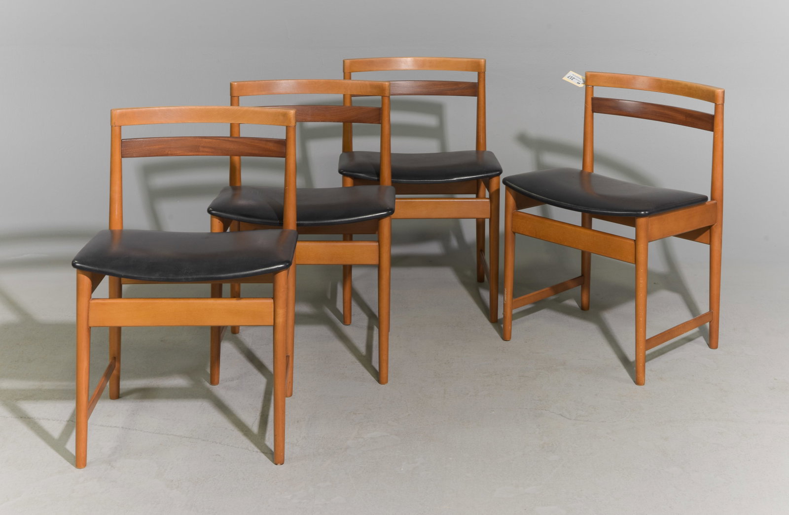 Mid Century Modern Set of 4 Dining Chairs: Danish Modern Style Set of 4 Dining Chairs with Black Vinyl Seats - 29 in tall x 19 x 19 each with a seat height of 18 inches
