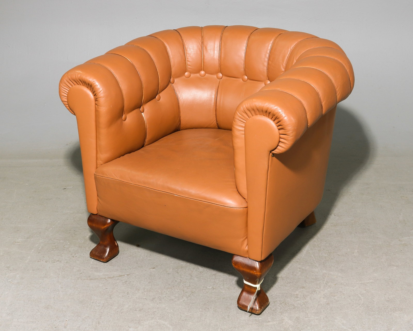 Danish Tan Leather Club Chair: Danish Tan Leather Club Chair - 28 in tall x 34 x 30 with a seat height of 15 inches
