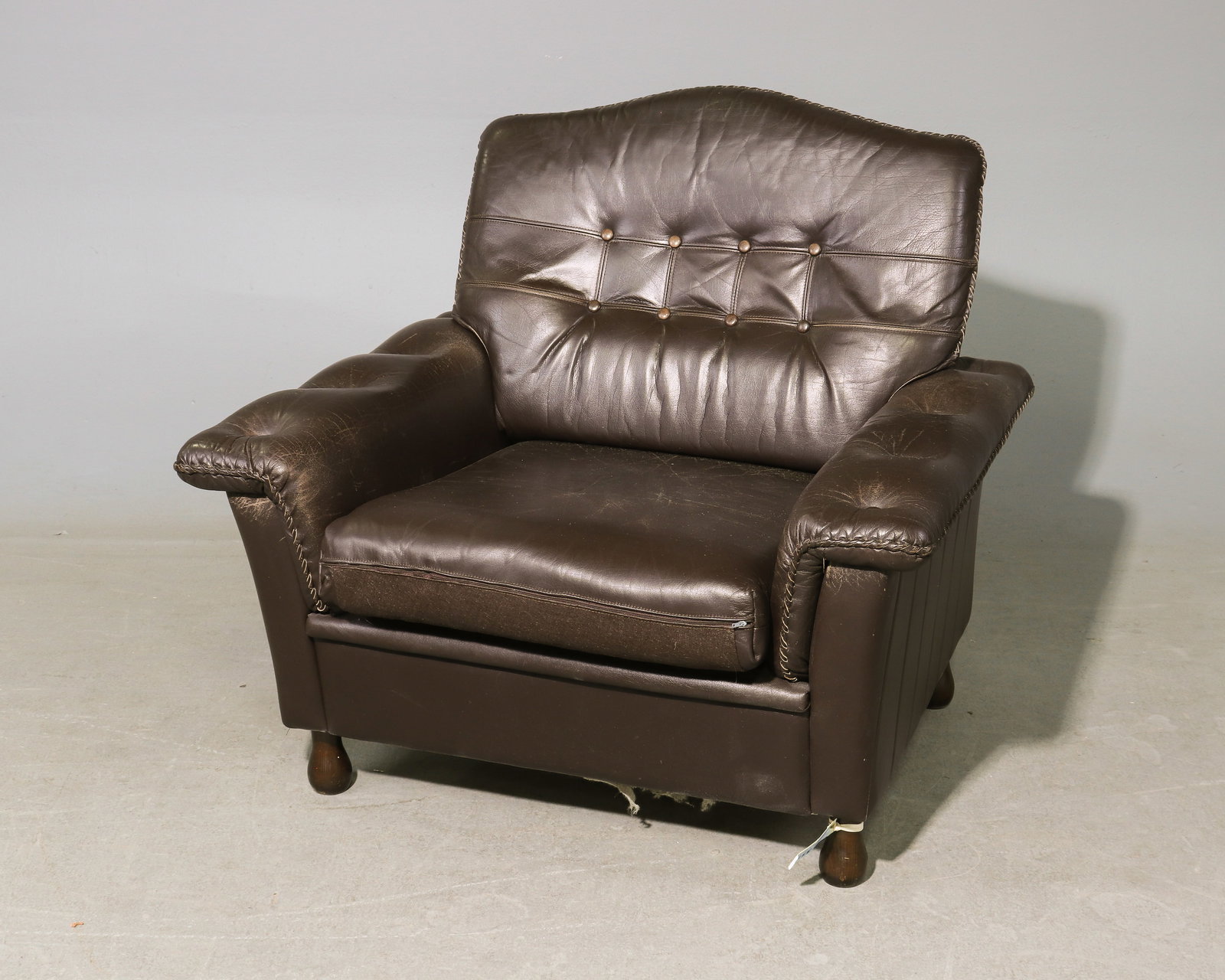 Danish Dark Brown Leather Arm Chair: Danish Dark Brown Leather Arm Chair - 34 in tall x 38 x 35 with a seat height of 18 inches