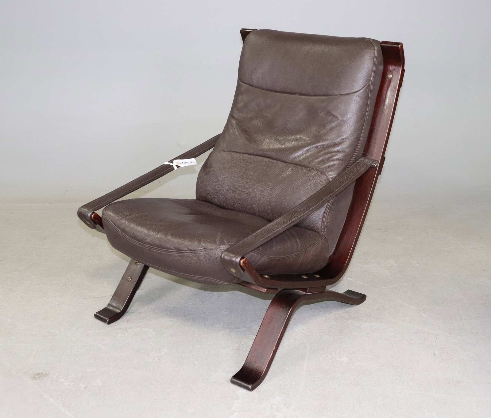 Scandinavian Modern Style Leather Lounge Chair: Scandinavian Modern Style Leather Lounge Chair - 35 in tall x 26.5 x 36, seat height is 16 in