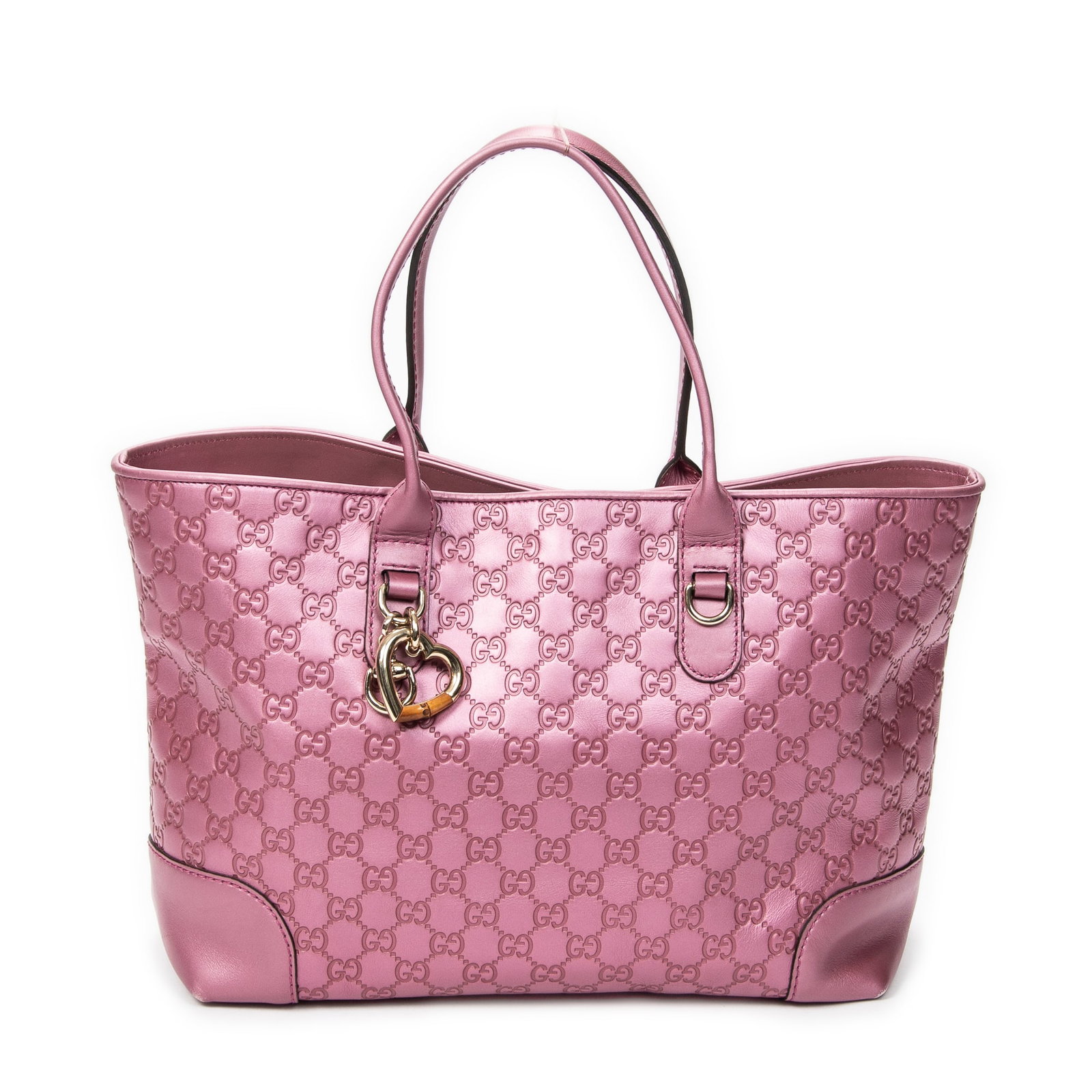 Gucci Heart Bit Open Tote in Pink Guccissima Leather: Genuine Pre-Owned Gucci Heart Bit Open Tote in Metallic Pink Guccissima Leather made in Italy in A condition. Date Code is 269956-520981 Measurements: 34*25*15cm (Length * Height * Width). This lot in