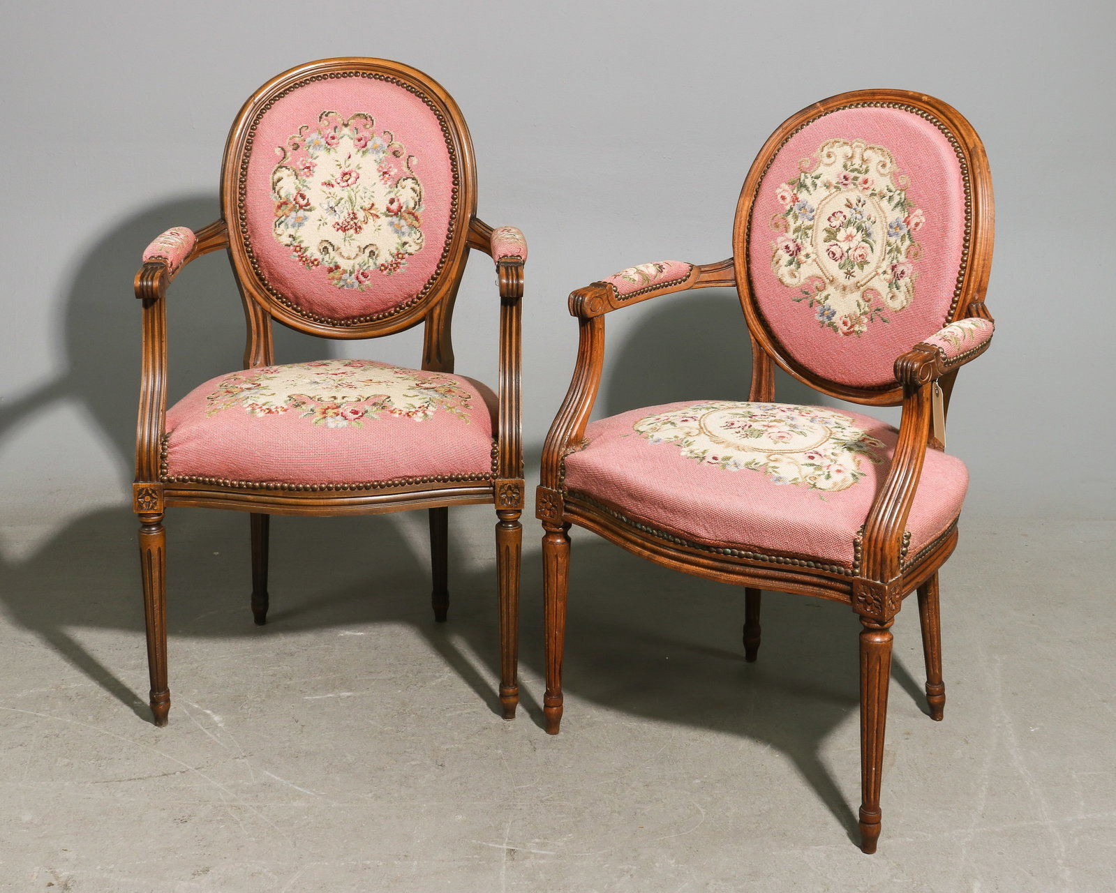 Louis XVI Style Walnut Pair of Arm Chairs: French Louis XVI Style Walnut Pair of Needlepoint Upholstered Arm Chairs - 38 in tall x 22.25 x 15.5 each with a seat height of 18 inches