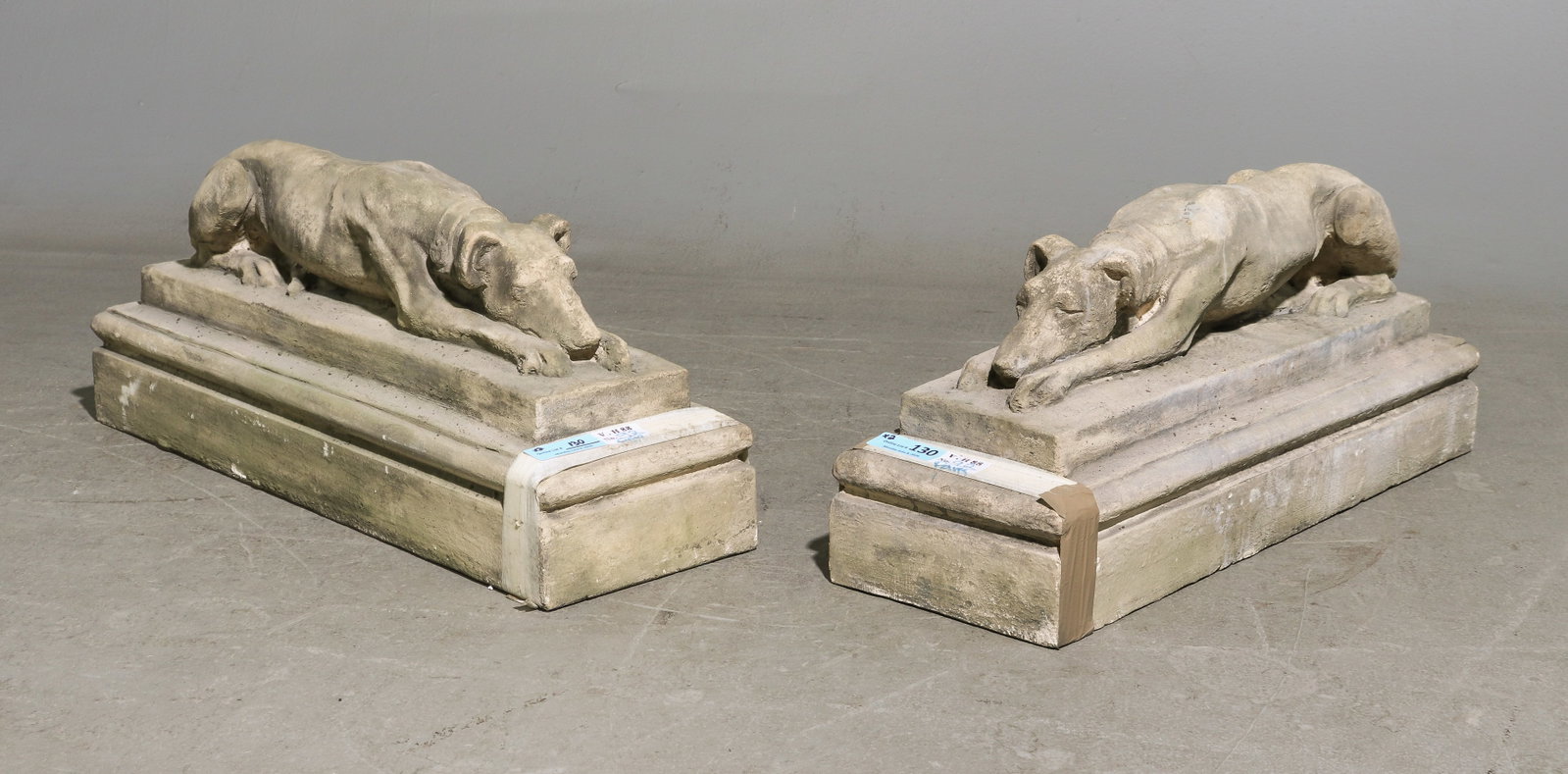 Pair of Cast Stone / Concrete Resting Whippets: Pair of Cast Stone / Concrete Resting Whippets - 12.5 in tall x 9.5 x 29 each - The tape is only there to keep the item number on