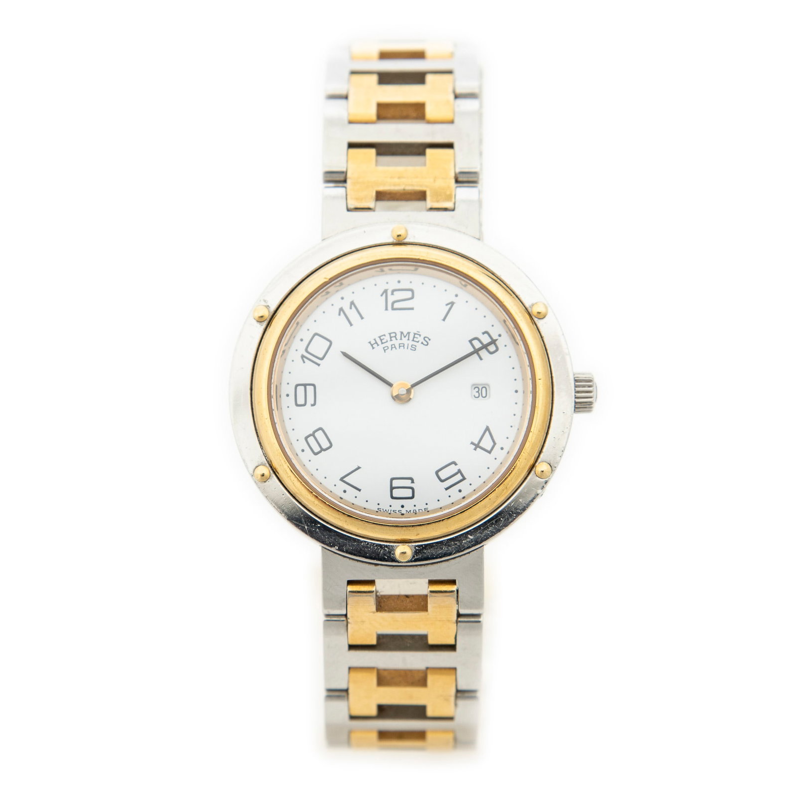 Hermes Clipper Watch in Gold/Silver Plated: Genuine Pre-Owned Hermes Clipper Watch in Gold/Silver Plated in A condition. Date Code is 298778 This lot includes the following accessories: None. Measurements: Bracelet: 16cm Dial: 2*2cm (Length * H