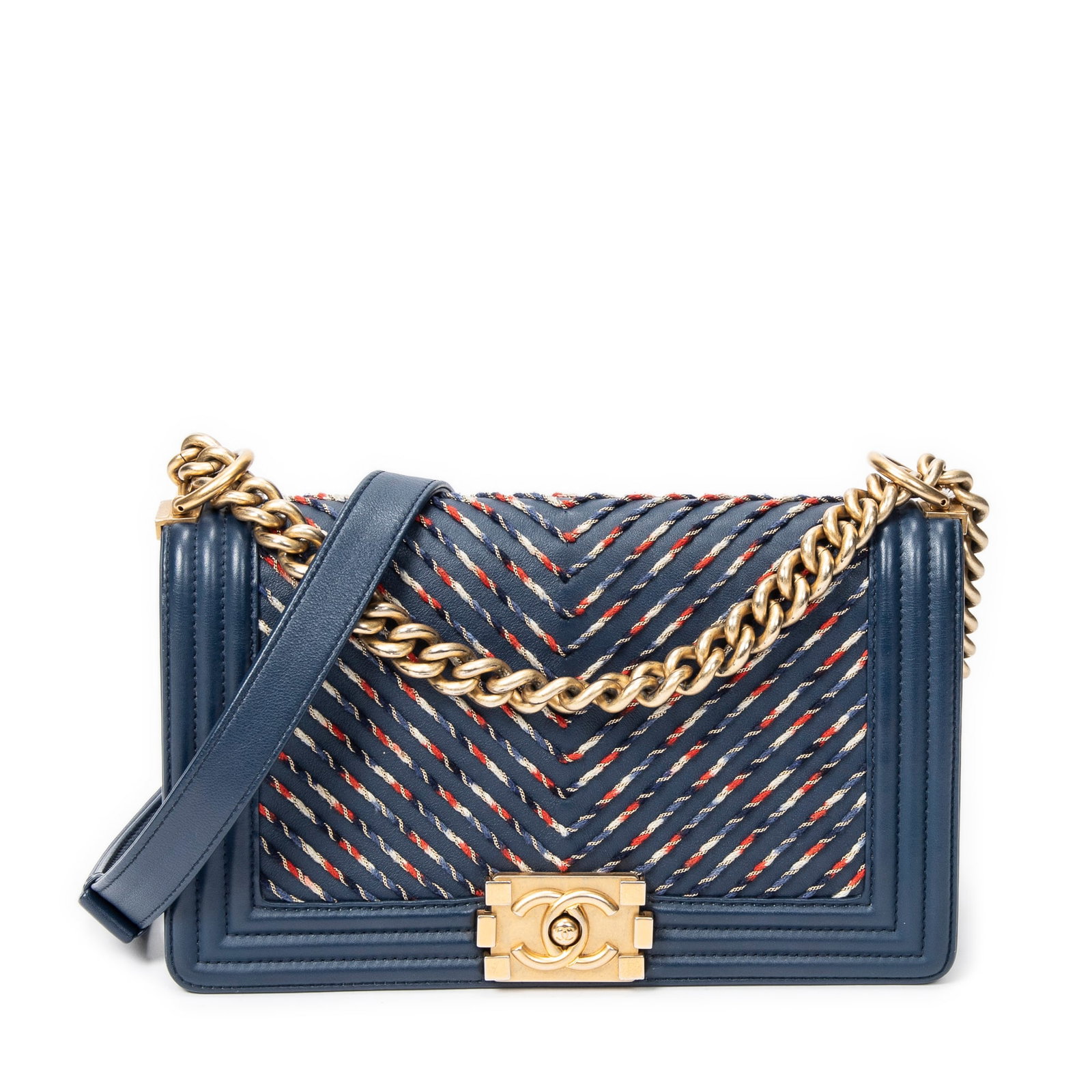 Chanel Medium By the Sea Boy Bag in Calfskin Leather: Genuine Pre-Owned Chanel Medium By the Sea Boy in Navy Chevron Embroidered Calfskin Leather made in France in A condition. Date Code is 27113606 (2019) Measurements: 24.5*14*7cm (Length * Height * Wid