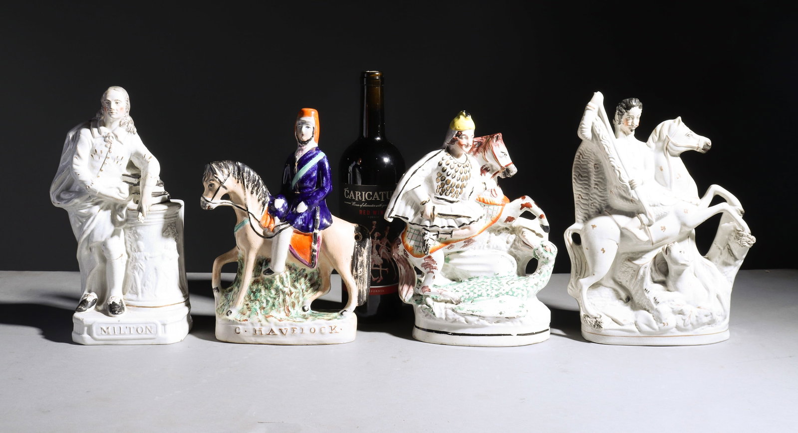 Four Assorted Staffordshire Figures: Four Assorted Staffordshire Figures - 11 in tall x 8.5 x 3, 10.5 in tall x 7.5 x 2.25, 11 in tall x 5 x 4 and 11 in tall x 7.5 x 3
