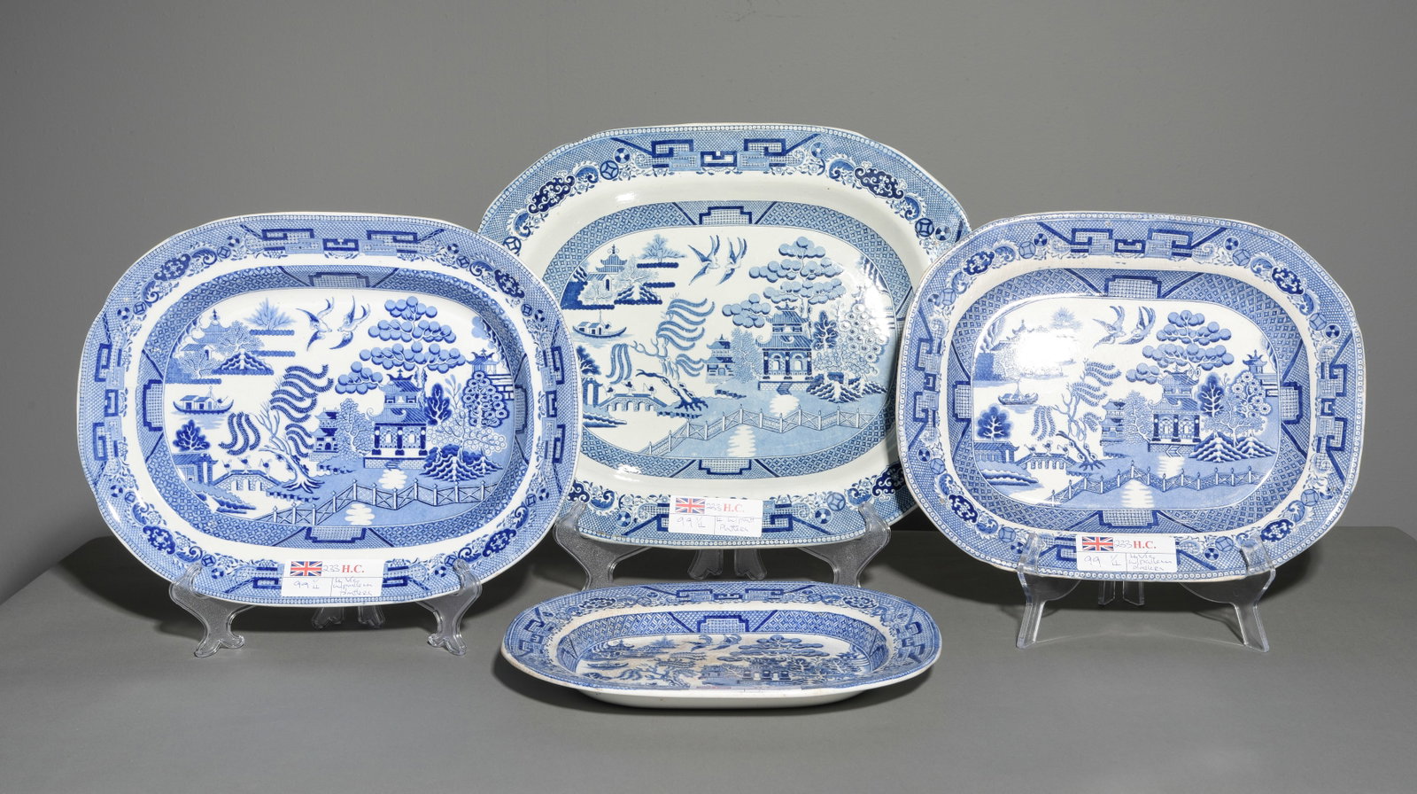 Four British Blue & White Willow Pattern Platters: Four British Blue & White Willow Pattern Platters - 2 in tall x 17 x 13.5, 2 in tall x 15 x 12, 2 in tall x 14 x 11.5 and 1.5 in tall x 12.5 x 10