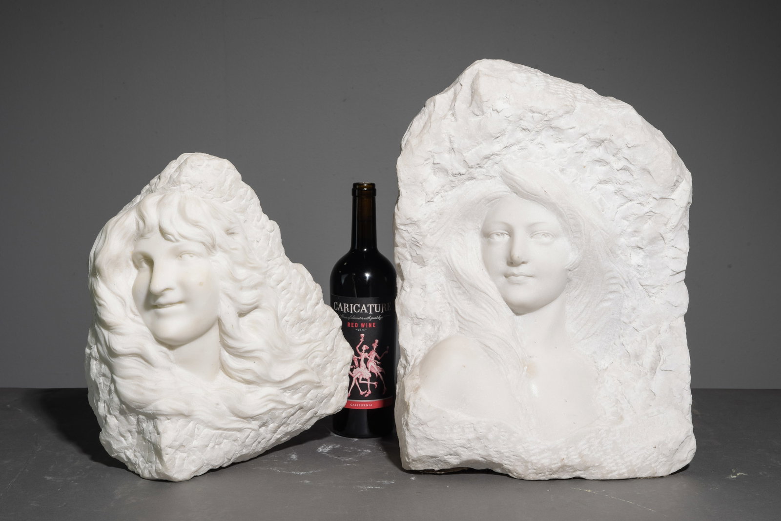 2pcs Carved Carrara Marble "Portraits": 2pcs Carved Carrara Marble "Portraits" - One is signed A. Goli - 17 in tall x 12 x 5 and 13 in tall x 11.5 x 6