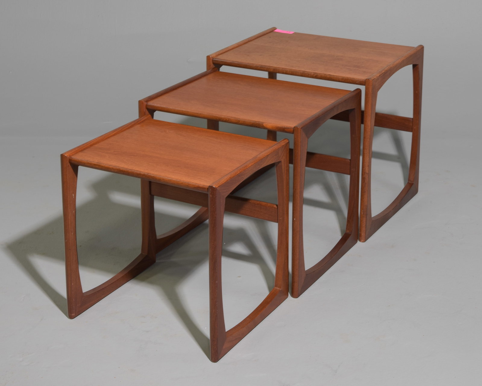 Mid Century Modern Quadrille Nest of 3 Tables: This Danish Modern Style Nest is British and made by Mid Century Modern Furniture Maker G Plan ( Gplan ) it stacks to make a bookcase as well. - 19.5 in tall x 21 x 17, 18 in tall x 19 x 15.25 and 17 