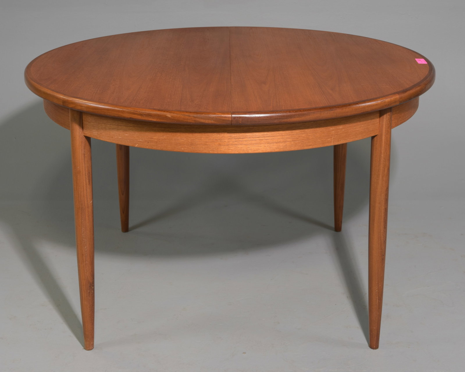 Round Mid Century Table with Pop Up Leaf - Gplan: This Danish Modern Style Teak Dining Table includes a pop-out butterfly style leaf & is made by Mid Century Modern Furniture Maker G Plan ( GPlan ) - Part of their Fresco Range. - 29 in tall x 48 inch