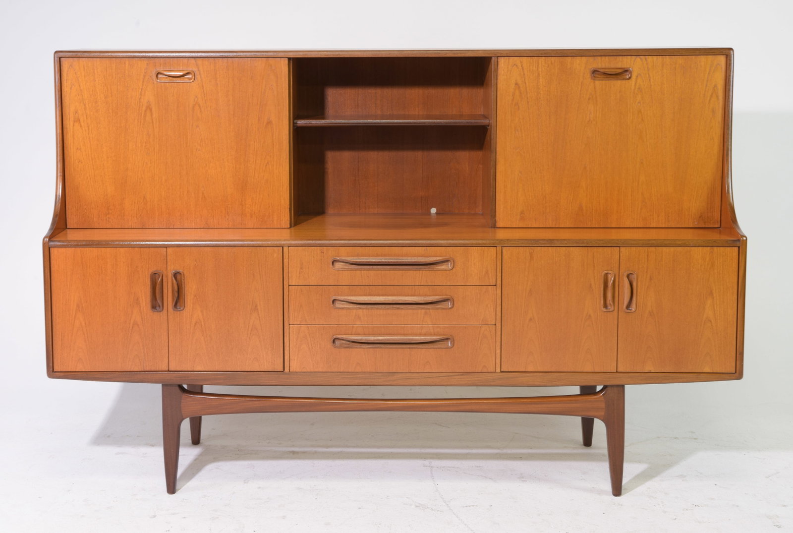 Mid Century Teak Fresco Cocktail Cabinet - Gplan: This Danish Modern Style hutch / high board is British and made by Mid Century Modern Furniture Maker G Plan ( Gplan ) & is part of their "Fresco" Range. It has a drop down section and open stretcher