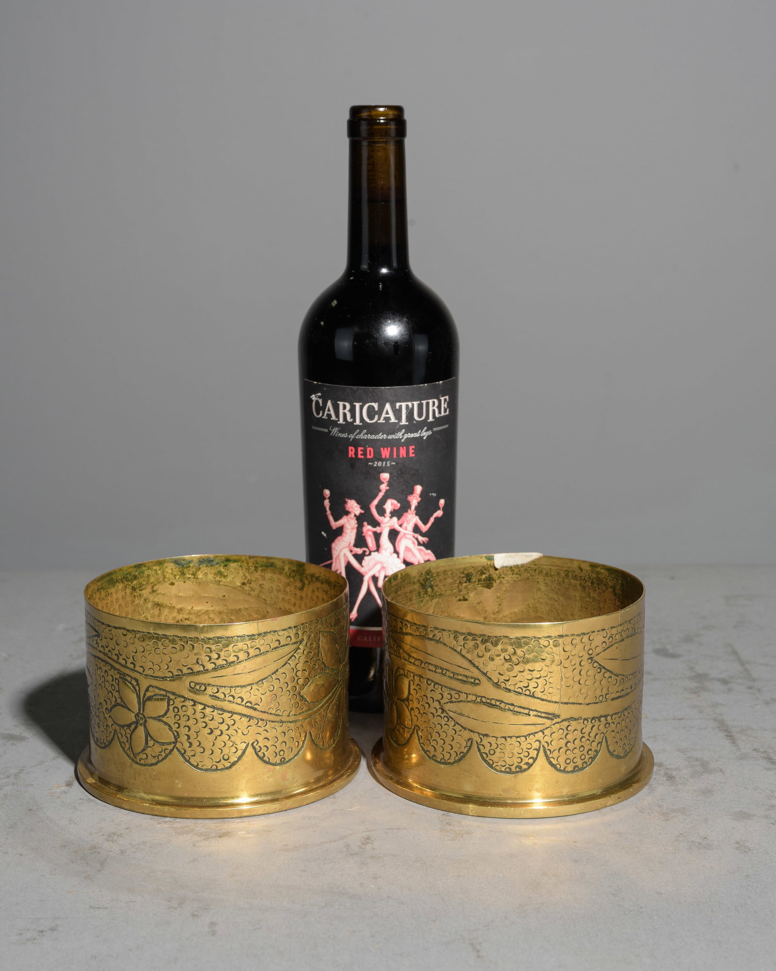 Pair of Brass Trench Art Vases / Wine Holders: Pair of Brass Trench Art Vases / Wine Holders - 3.5 in tall x 5 inch diameter each