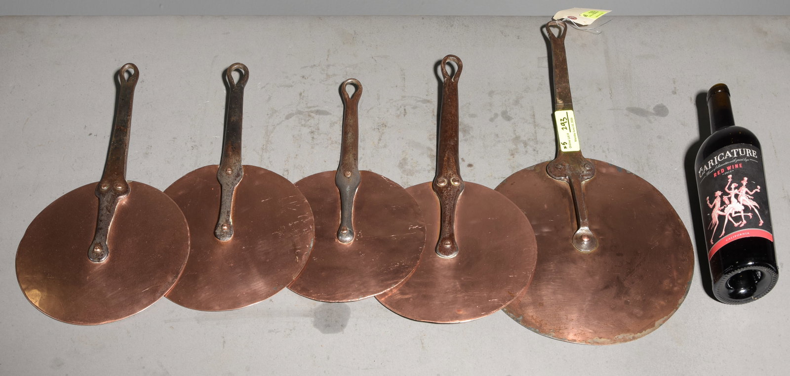 Five Assorted French Copper Lids with Iron Handles: Five Assorted French Copper Lids with Iron Handles - Largest is 1 in tall x 11.25 x 20