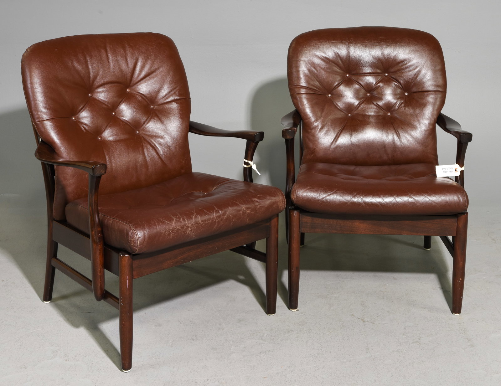 Danish Pair of Tufted Brown Leather Arm Chairs: Danish Pair of Tufted Brown Leather Mahogany Arm Chairs - 35.5 in tall x 27 x 31 each with a seat height of 17 inches