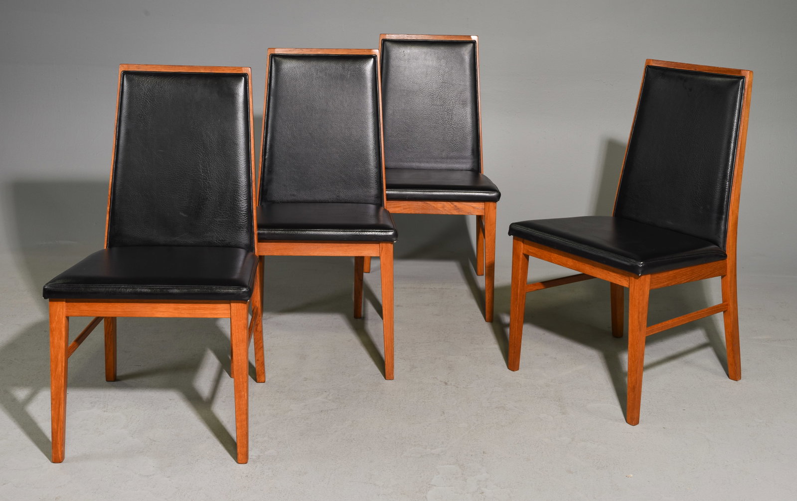 Mid Century Modern Set of 4 Black Vinyl Chairs: Danish Modern Style Set of 6 Black Vinyl Upholstered Dining Chairs - 35.5 in tall x 19.25 x 21 each with a seat height of 18 inches