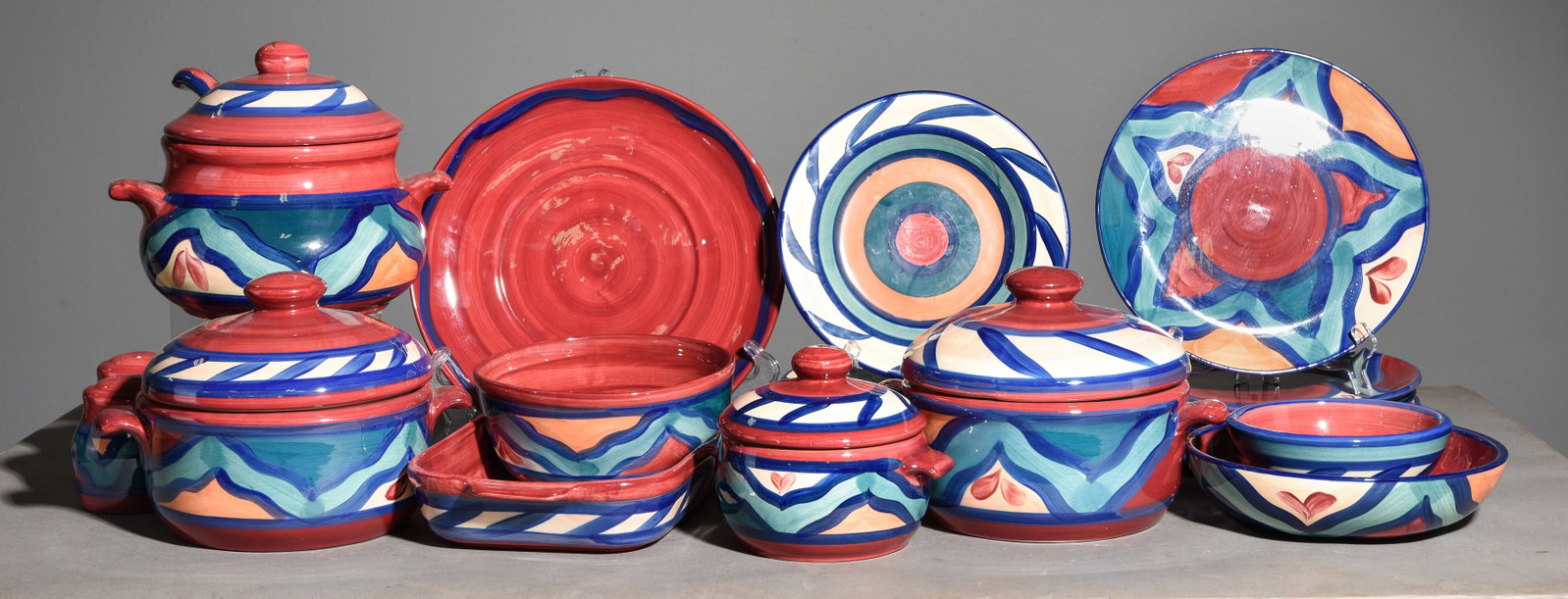 21pcs Gail Pittman Hand Painted "Red Azalea" China: 21pcs Gail Pittman Hand Painted "Red Azalea" China consisting of Serving Tureens, Plates, Bowls, Etc. - Largest tureen is 8 in tall x 10 x 8.5 and the largest plate is 1.5 in tall x 12 inch diameter