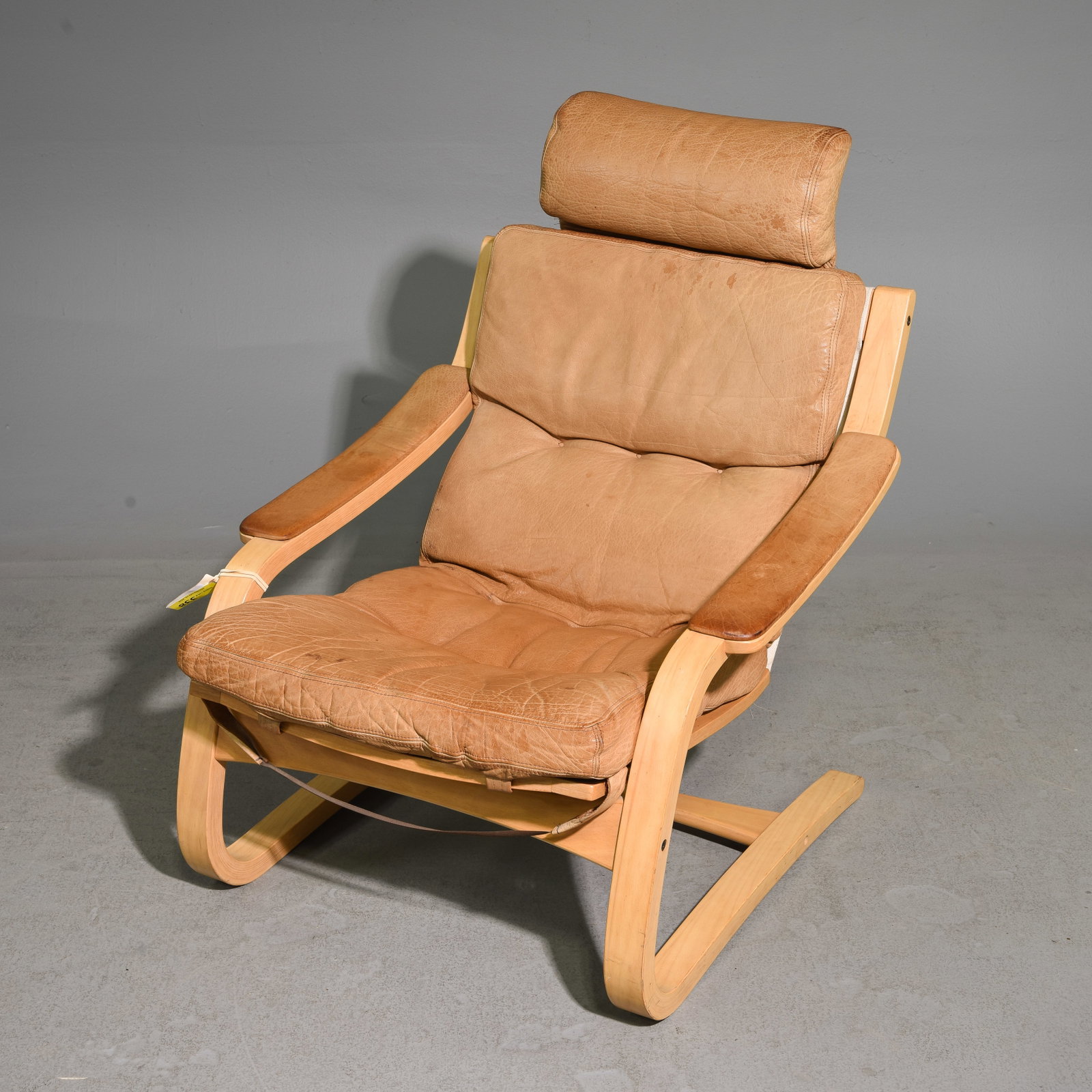Danish Modern Leather Upholstered Lounge Chair: Danish Modern Leather Upholstered Lounge Chair - 36 in tall x 28.5 x 30 with a seat height of 15.5 inches