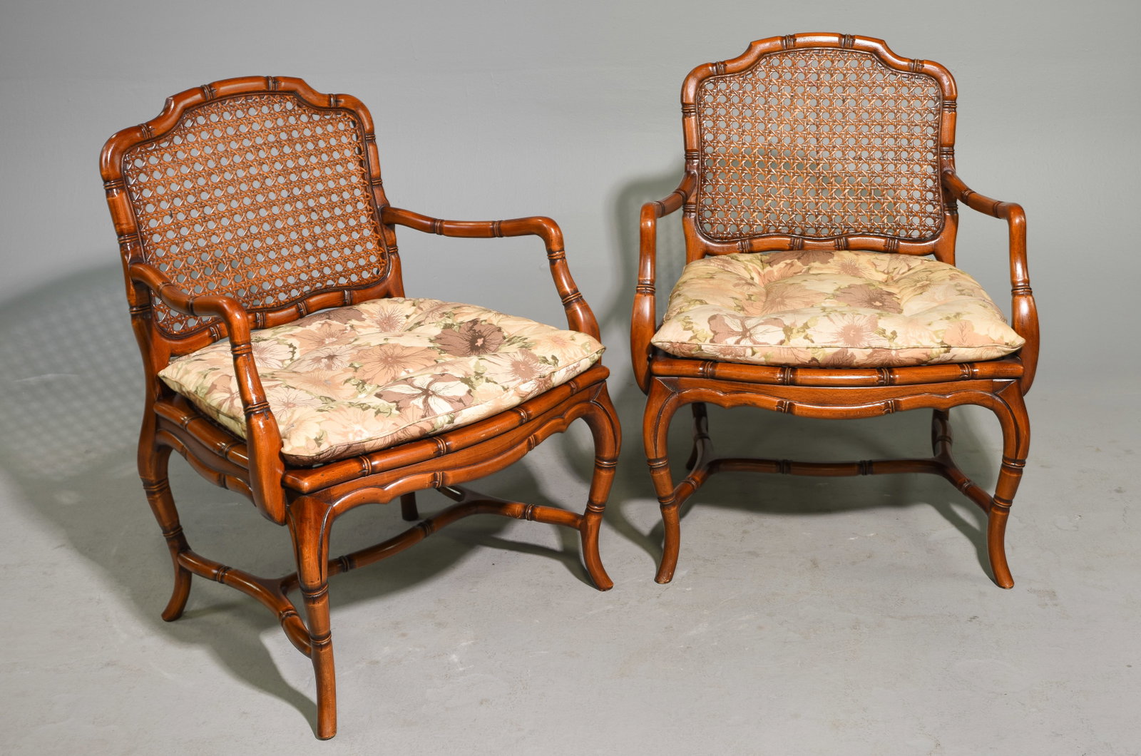 2 French Faux Bamboo Caned Arm Chairs: 2 French Faux Bamboo Caned Arm Chairs - 34.5 in tall x 27 x 24 each with a seat height of 19 inches