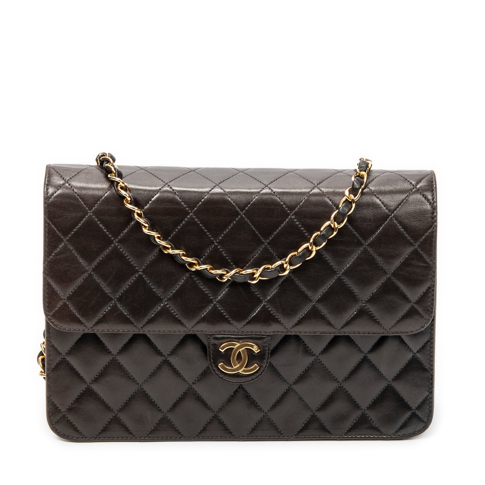 Chanel Vintage Push Lock Straight Flap in Black: Genuine Pre-Owned Chanel Vintage Push Lock Straight Flap in Black Quilted Lambskin Leather made in France in A condition. Date Code is 4979457 (1996-1997) Measurements: 25*17*5cm (Length * Height * Wi