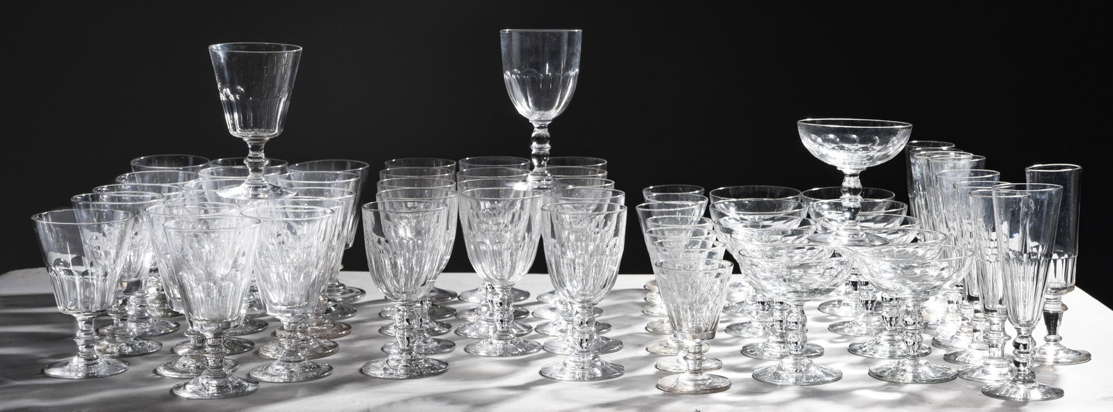 59pcs Assorted Clear Glass Stems / Glasses: 59pcs Assorted Clear Glass Stems / Glasses - 14 are 5.5 in tall x 3.5 inch diameter each, 9 are 6.5 in tall x 2 inch diameter each, 18 are 6 in tall x 3 inch diameter each, 7 are 4.5 in tall x 2.5
