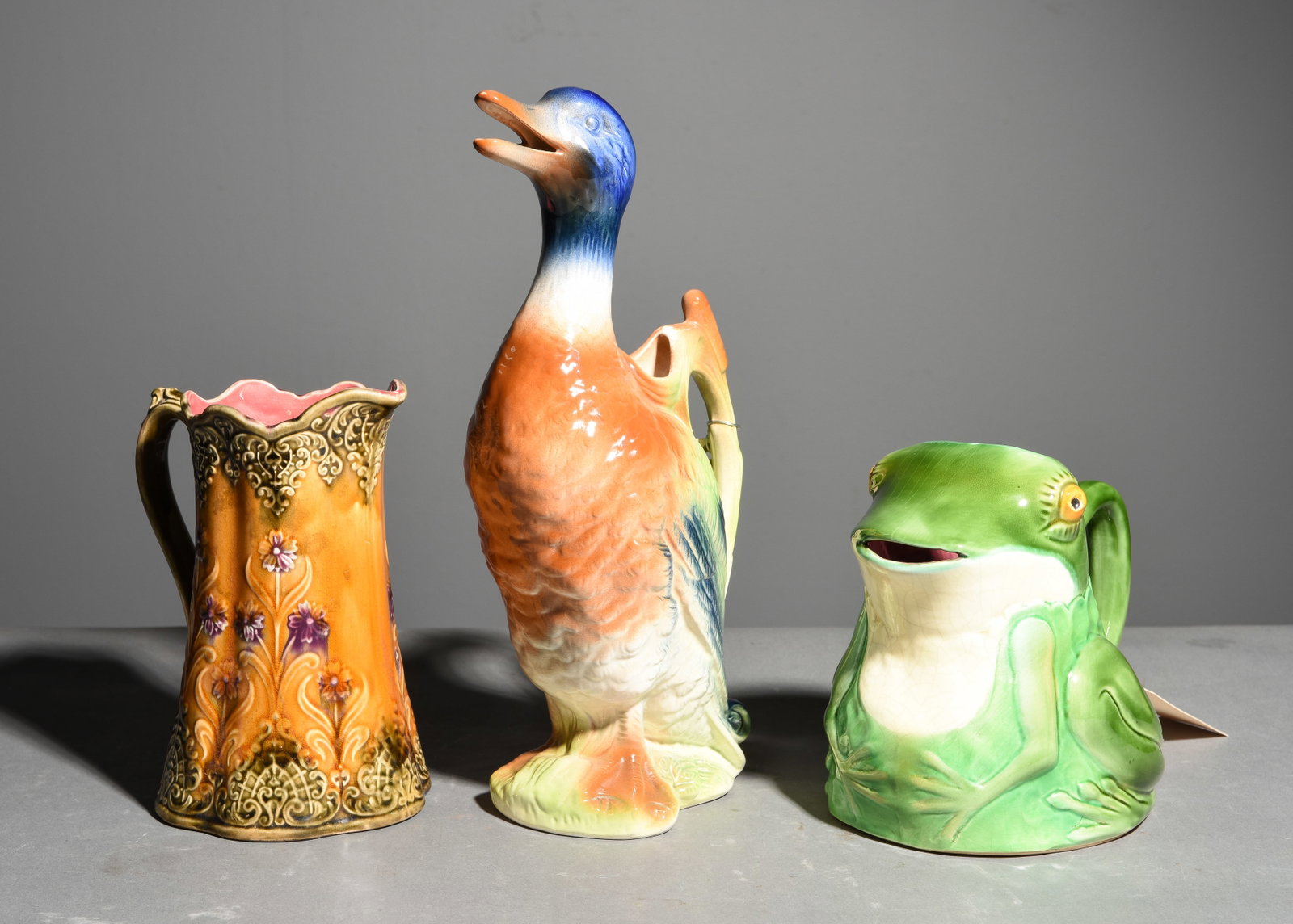 3 Assorted French Majolica Pitchers: 3 Assorted French Majolica Pitchers - 13 in tall x 6 x 4, 8 in tall x 6 x 5, and 6 in tall x 8 x 6.5