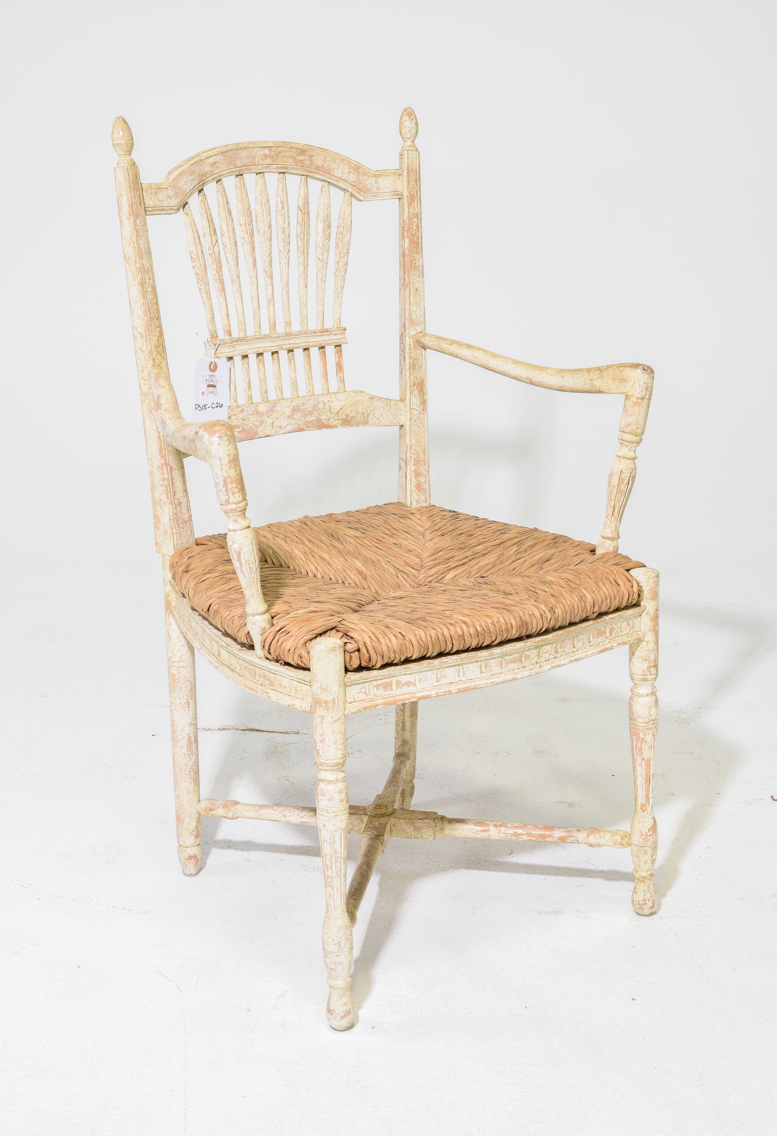 Distressed Painted Rush Seat Arm Chair: Distressed Painted Rush Seat Arm Chair - 38 in tall x 25.75 x 18.5 with a seat height of 18.5 inches